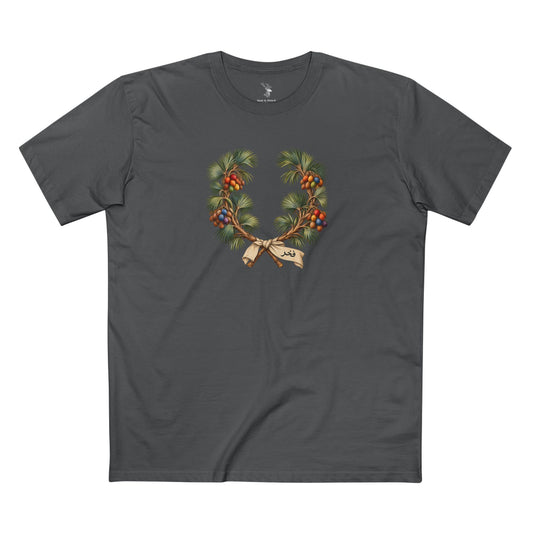 Front view of a T-shirt featuring a Sudanese doum palm Pride wreath with rainbow fruit and Arabic فخر lettering on an ivory ribbon.