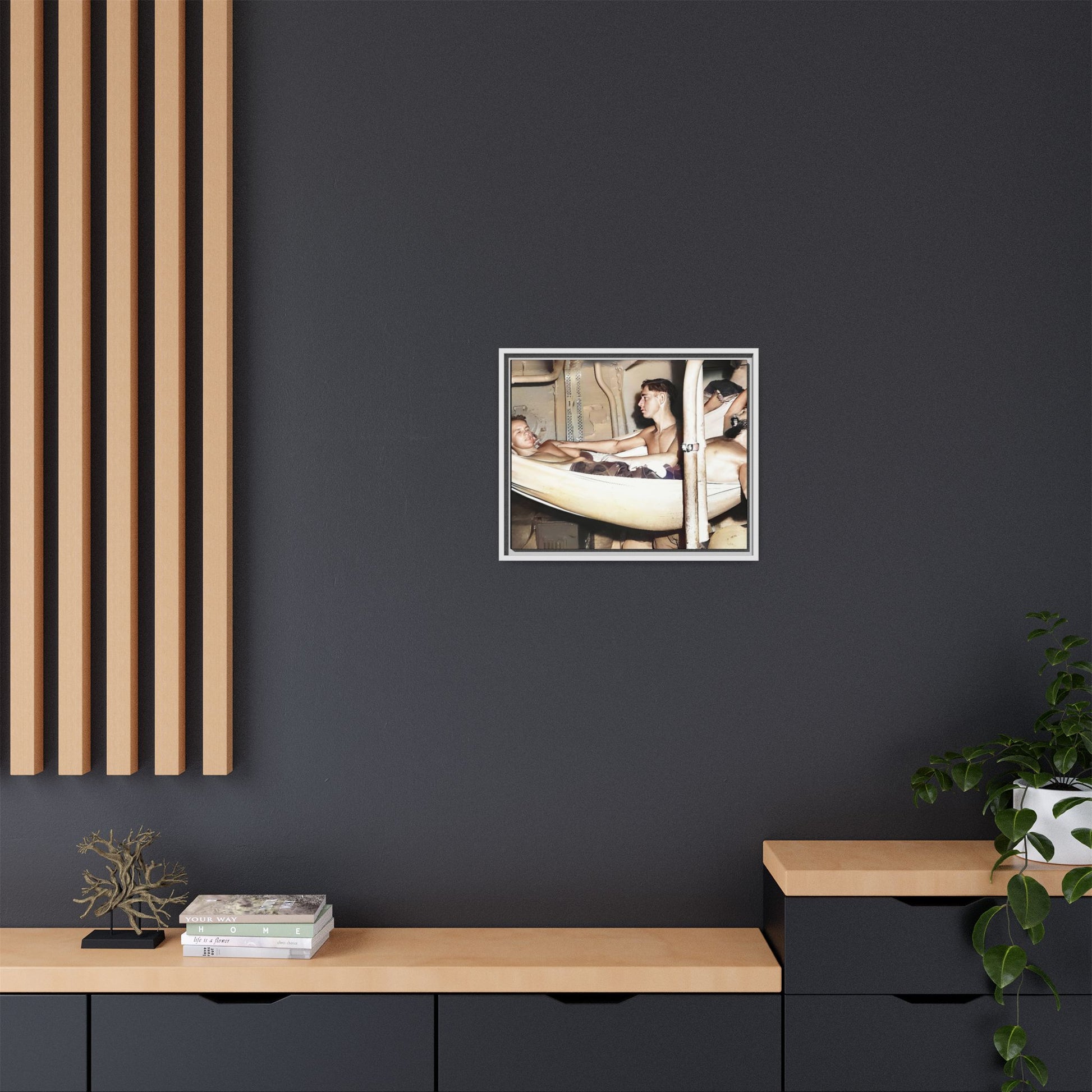 A framed vintage maritime photo on matte canvas featuring sailors aboard the Orleans, capturing life at sea and camaraderie.