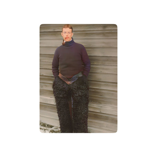 Vintage photo of a rugged Alaskan pioneer in wool chaps and a high-collared sweater, embodying Queer resilience and frontier spirit.