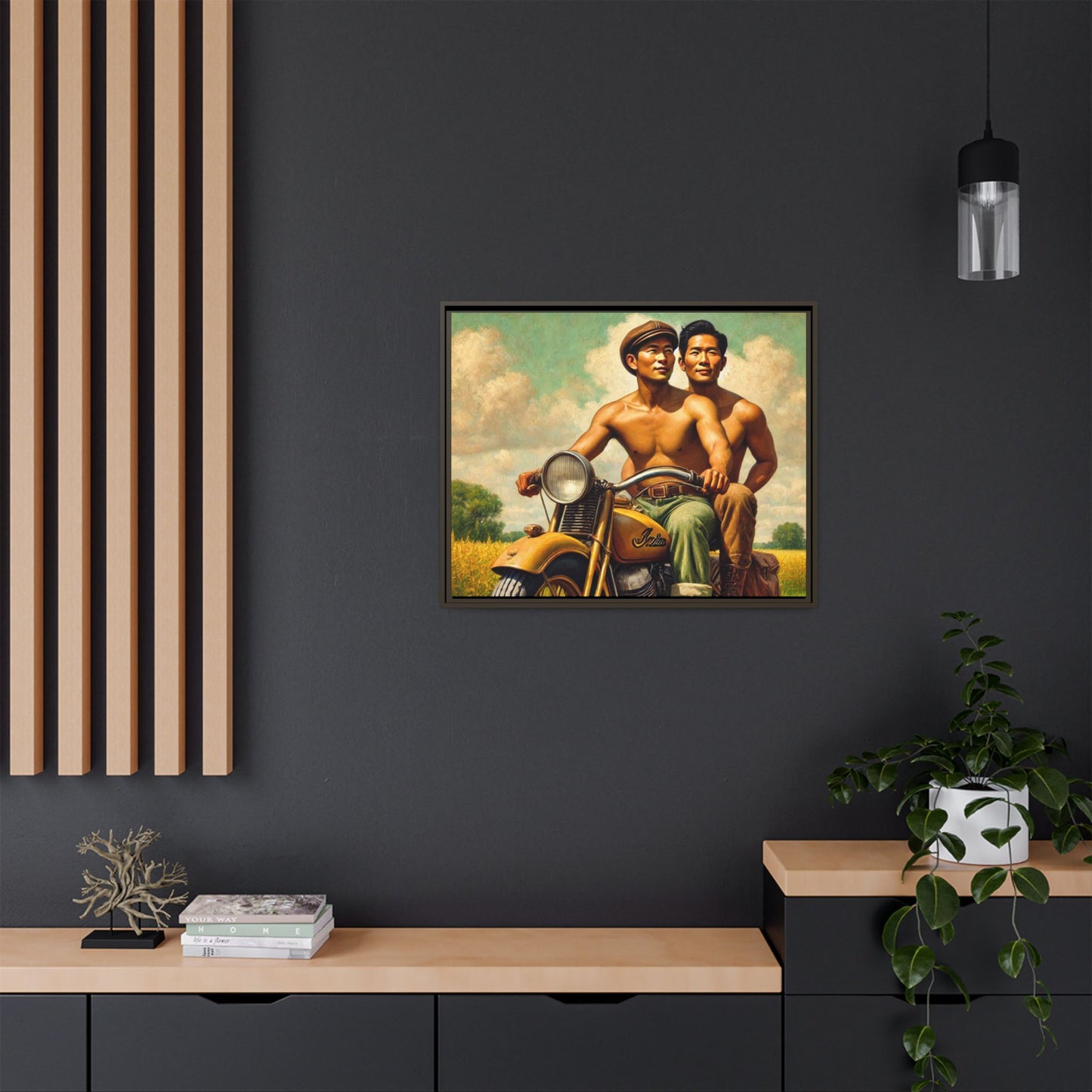 Framed artwork of an Asian-American gay couple riding a vintage yellow motorcycle through Iowa's serene countryside, celebrating love and unity.