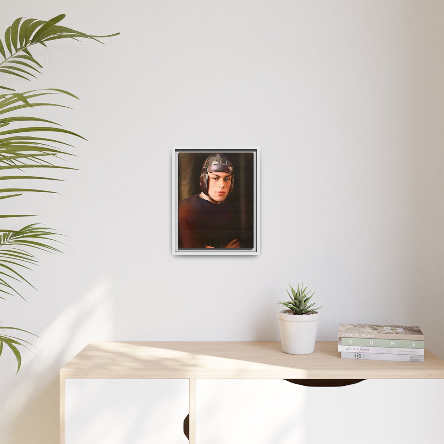 A vintage portrait of Andrew, a football player from Lincoln, Nebraska, in a classic leather helmet. This framed matte canvas print captures the grit and determination of early 20th-century sports, perfect for football fans and vintage art collectors.