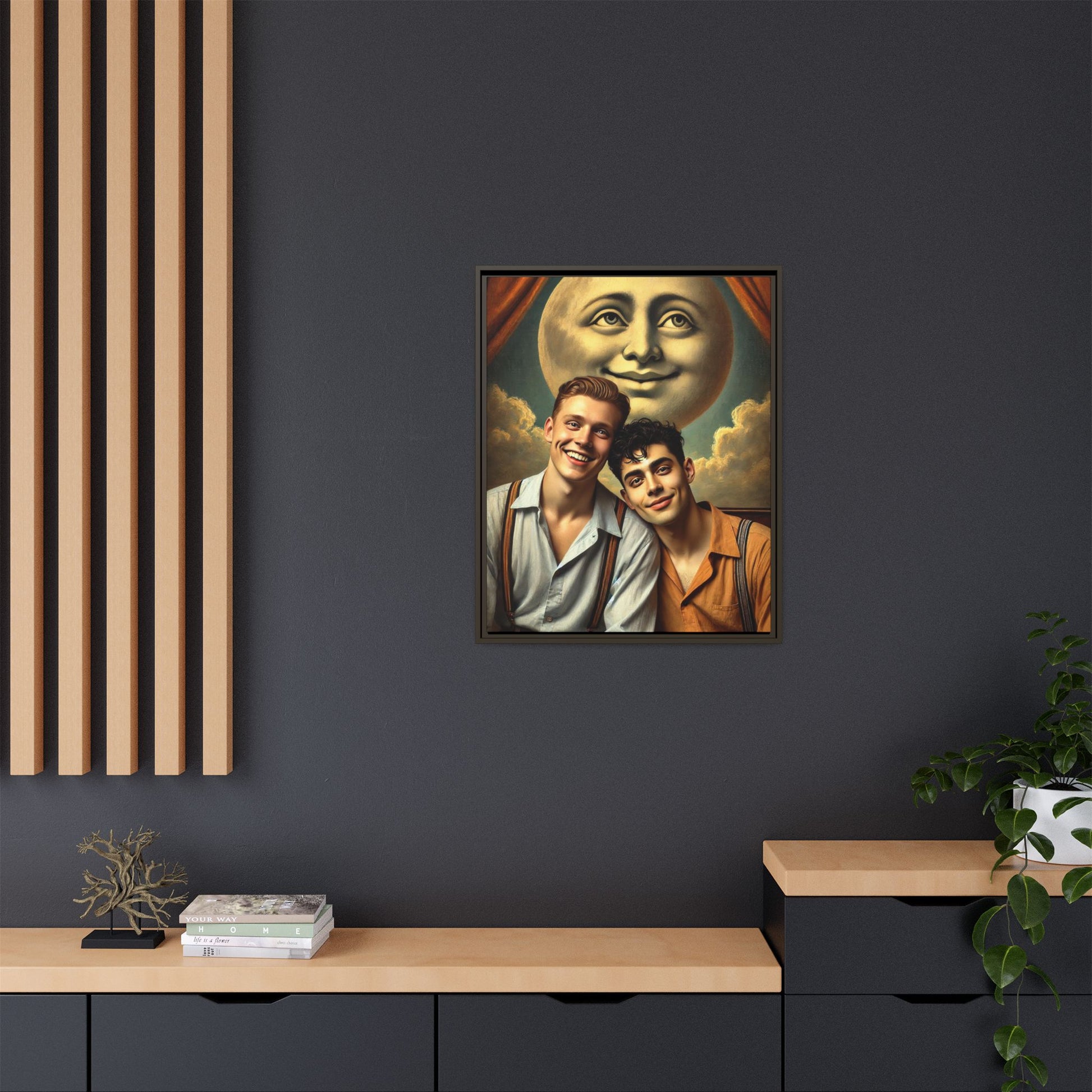 Framed artwork featuring a joyful queer couple in 1930s attire, seated close together beneath a smiling full moon in a theatrical studio setting. A celebration of reclaimed LGBTQ+ narratives in nostalgic portraiture.
