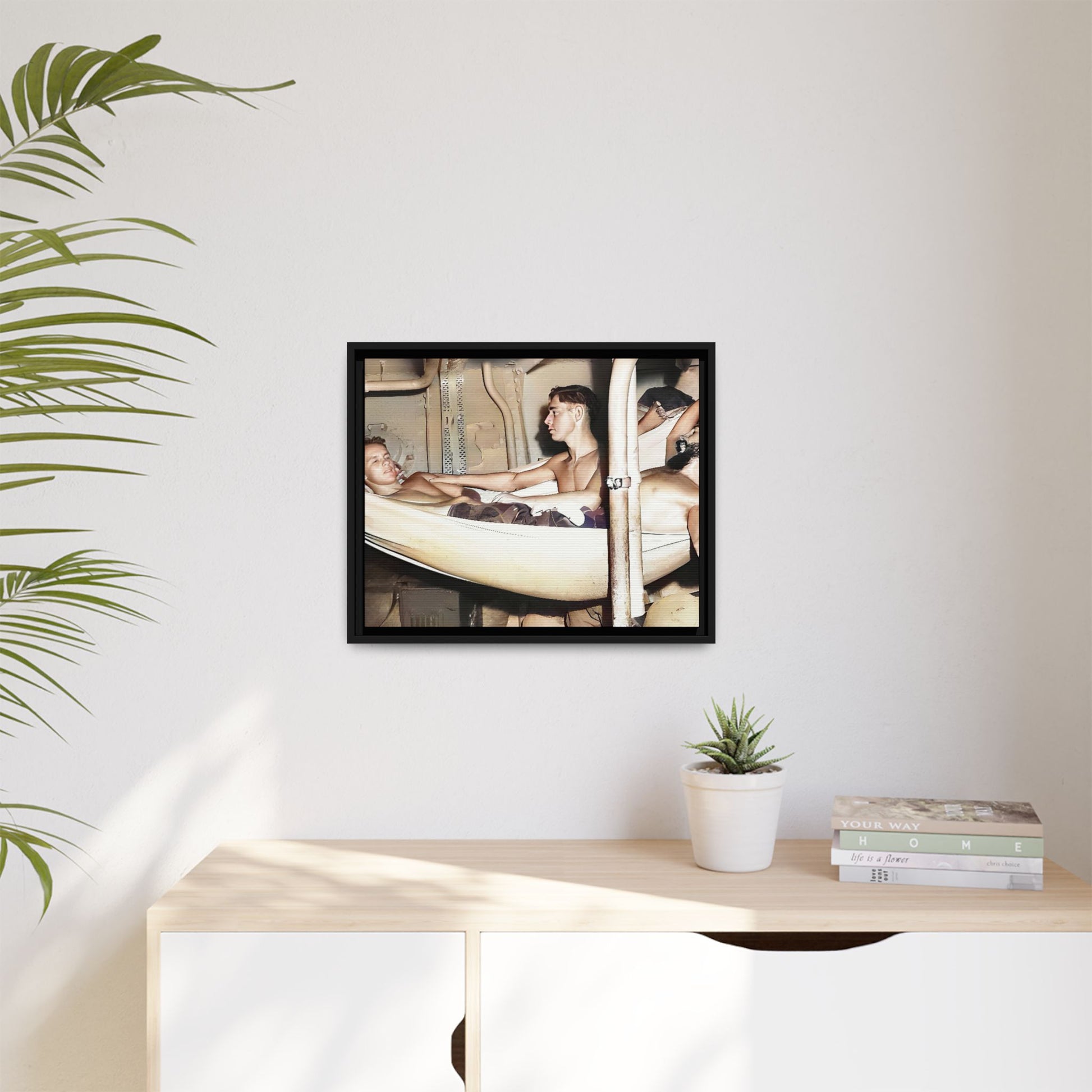 A framed vintage maritime photo on matte canvas featuring sailors aboard the Orleans, capturing life at sea and camaraderie.