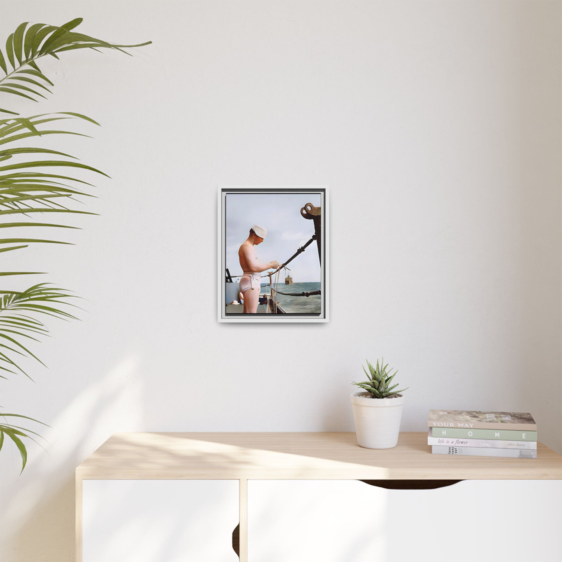 A framed vintage naval portrait on matte canvas featuring a sailor aboard the USS Iowa, honoring maritime history and dedication.