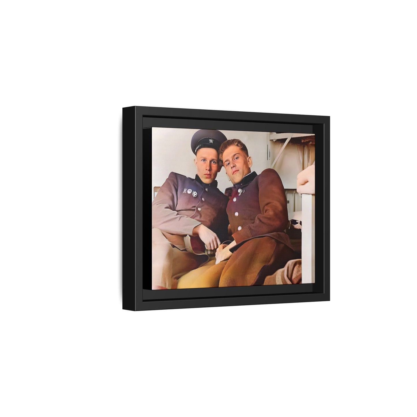 A restored vintage photograph of two Russian soldiers in uniform, seated together in their quarters in Volgograd, Russia. Their relaxed postures and warm expressions capture a moment of camaraderie, resilience, and military history. A powerful tribute to LGBTQ+ representation in the armed forces. Gay Couple Винтажное фото  гей-пара