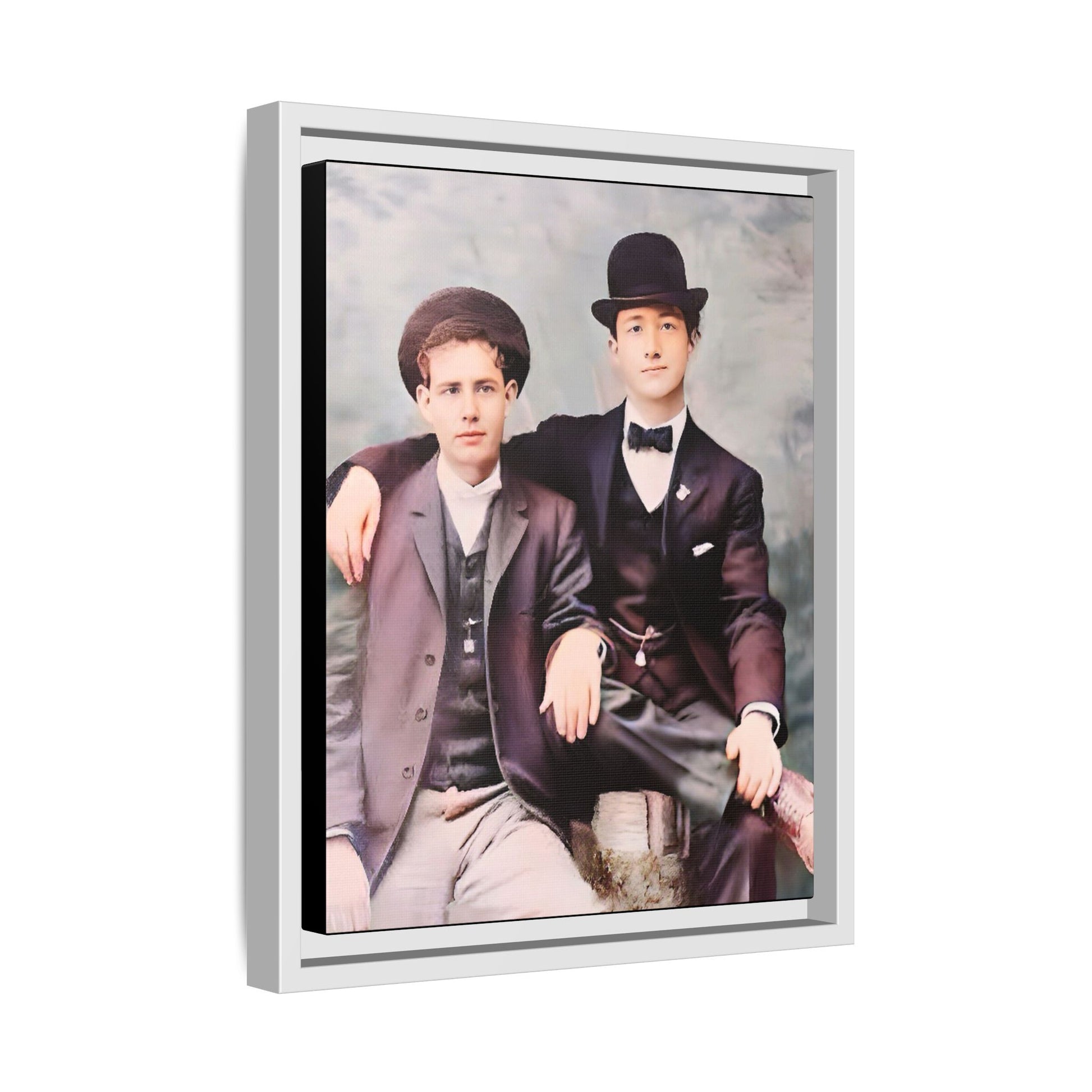 A stunningly restored early 20th-century portrait of Francis and Fai in Santa Barbara, California. Dressed in elegant bowler hats and classic suits, the two men share a poised yet deeply connected moment. The soft pastel tones and refined attire highlight a timeless love story, celebrating LGBTQ+ history and authentic companionship. Gay Couple
