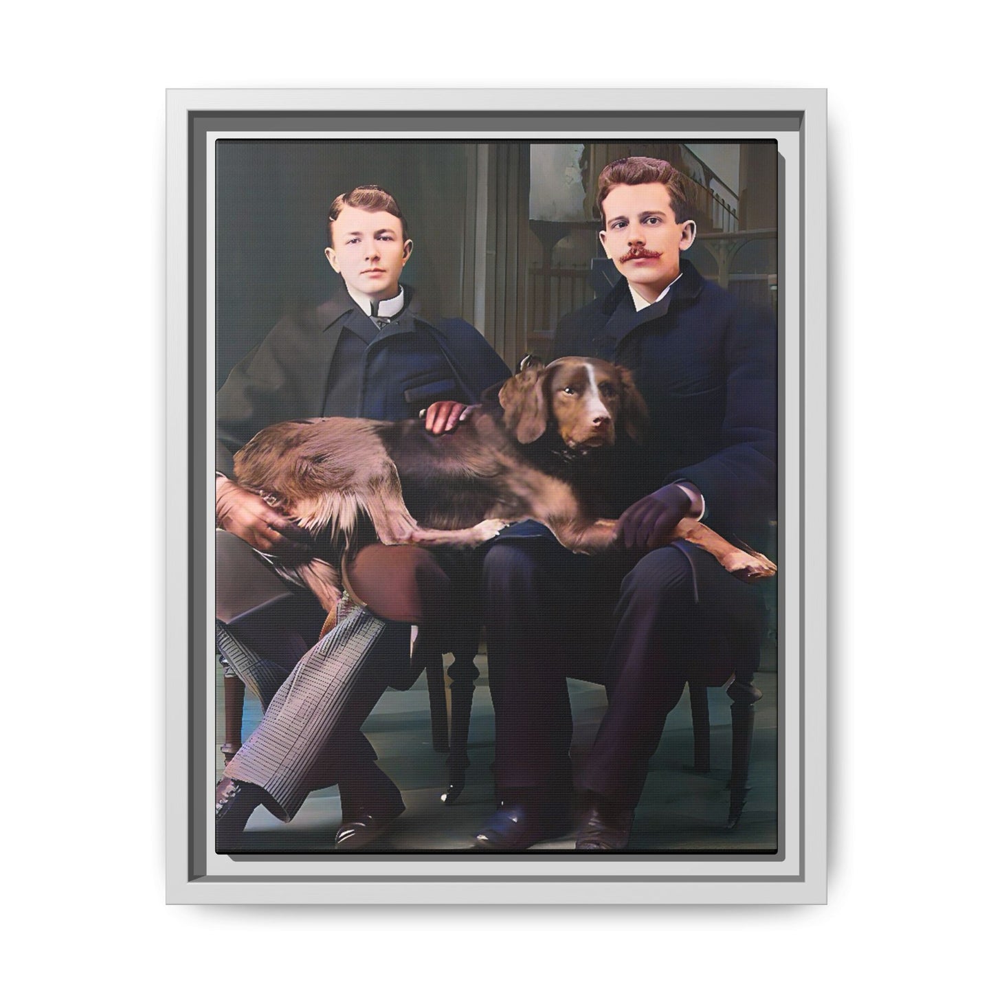 A beautifully restored 1930s black-and-white photograph featuring Clarence and Raymond seated in a stately New England home, with their beloved dog Luna resting comfortably across their laps. Dressed in refined coats and classic trousers, the couple exudes love, companionship, and timeless elegance, reflecting a warm and historic moment of LGBTQ+ history. Gay Couple