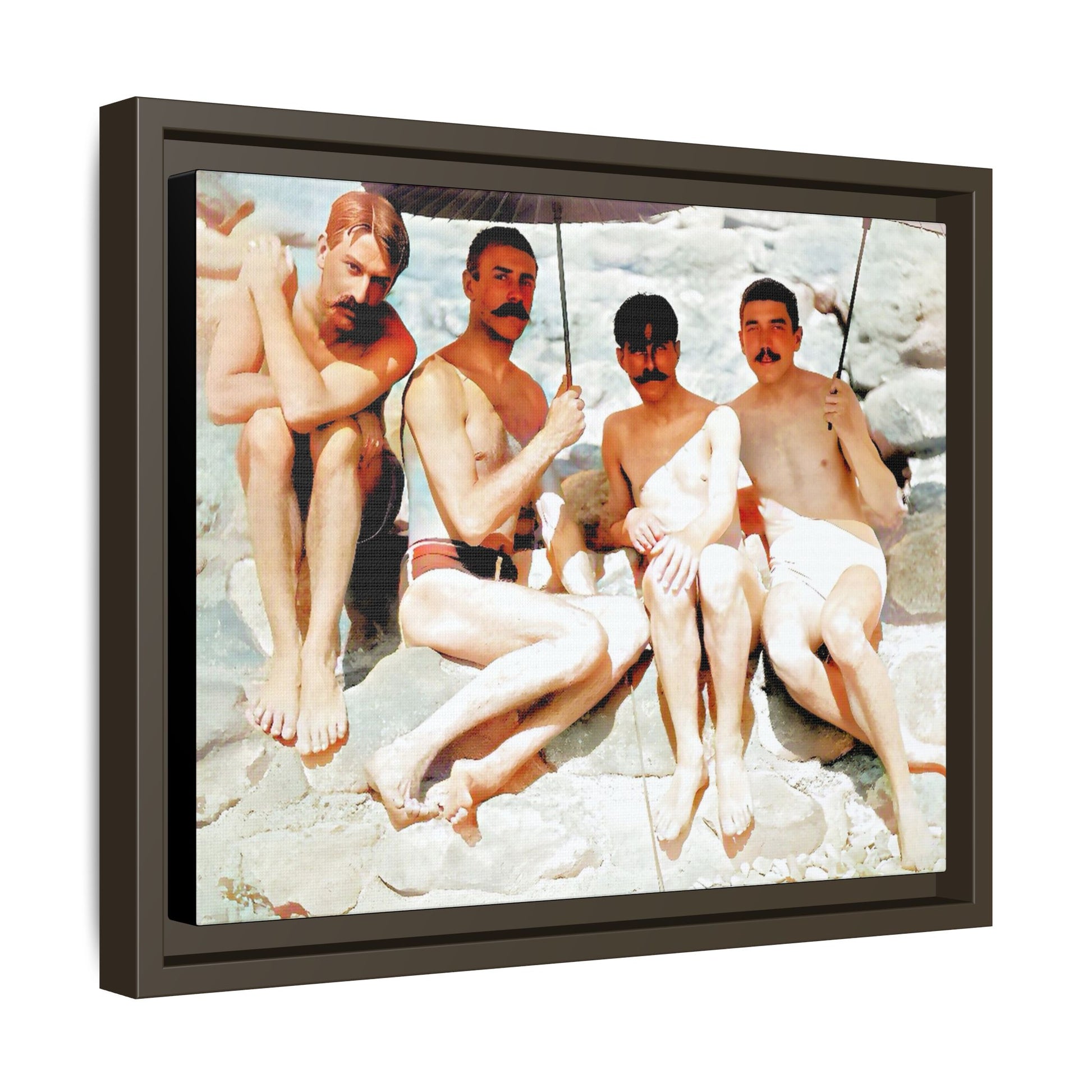 A nostalgic vintage beach photograph from Herring Cove Beach, Provincetown, MA. This framed canvas print captures four men in a relaxed summer moment, perfect for coastal home decor or as an LGBTQ+ history tribute.