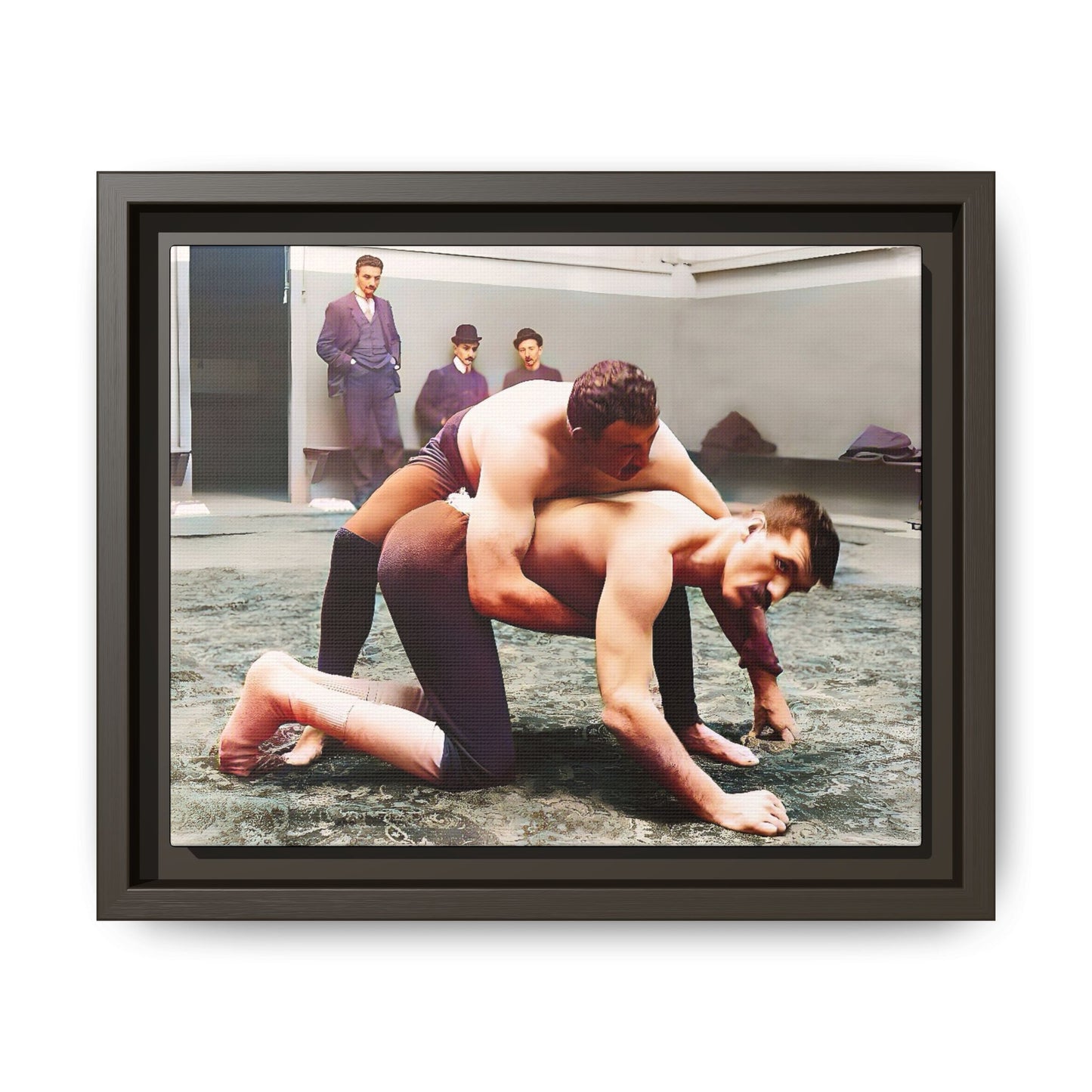 A framed vintage wrestling photograph on matte canvas featuring a Victorian-era match at Love’s Wrestling Club in Plumstead, UK, capturing strength and camaraderie.