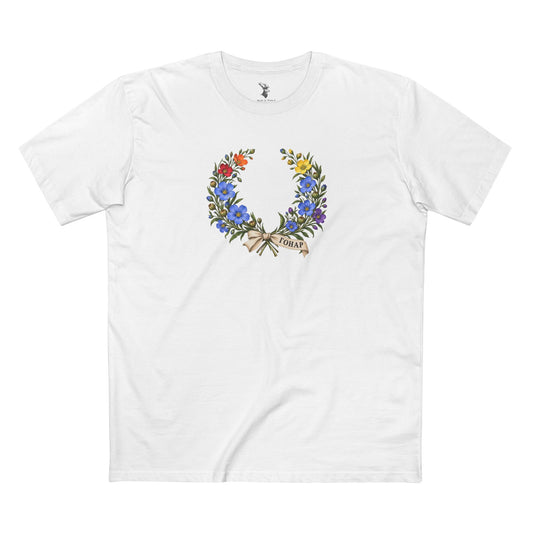 Front view of a Belarusian Pride T-shirt featuring a flax flower laurel wreath and an ivory ГОНАР ribbon.