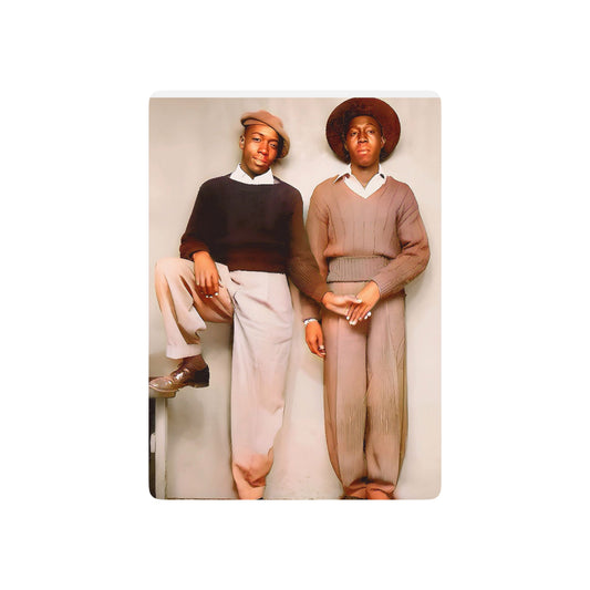 Vintage photo of a Black gay couple in Memphis, dressed in stylish mid-century fashion, symbolizing Queer love and defiance.