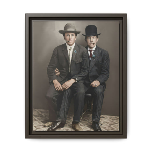Historical studio portrait showing two seated figures in tailored striped suits and formal hats