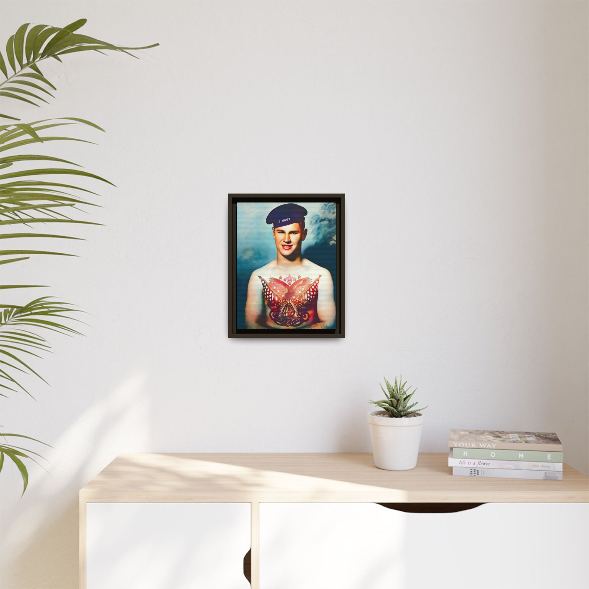 A striking vintage portrait of Charlie, a proud U.S. Navy sailor at Norfolk Navy Yard, showcasing a patriotic tattoo. This framed matte canvas print celebrates military history, individuality, and LGBTQ+ representation—perfect for collectors and history enthusiasts.