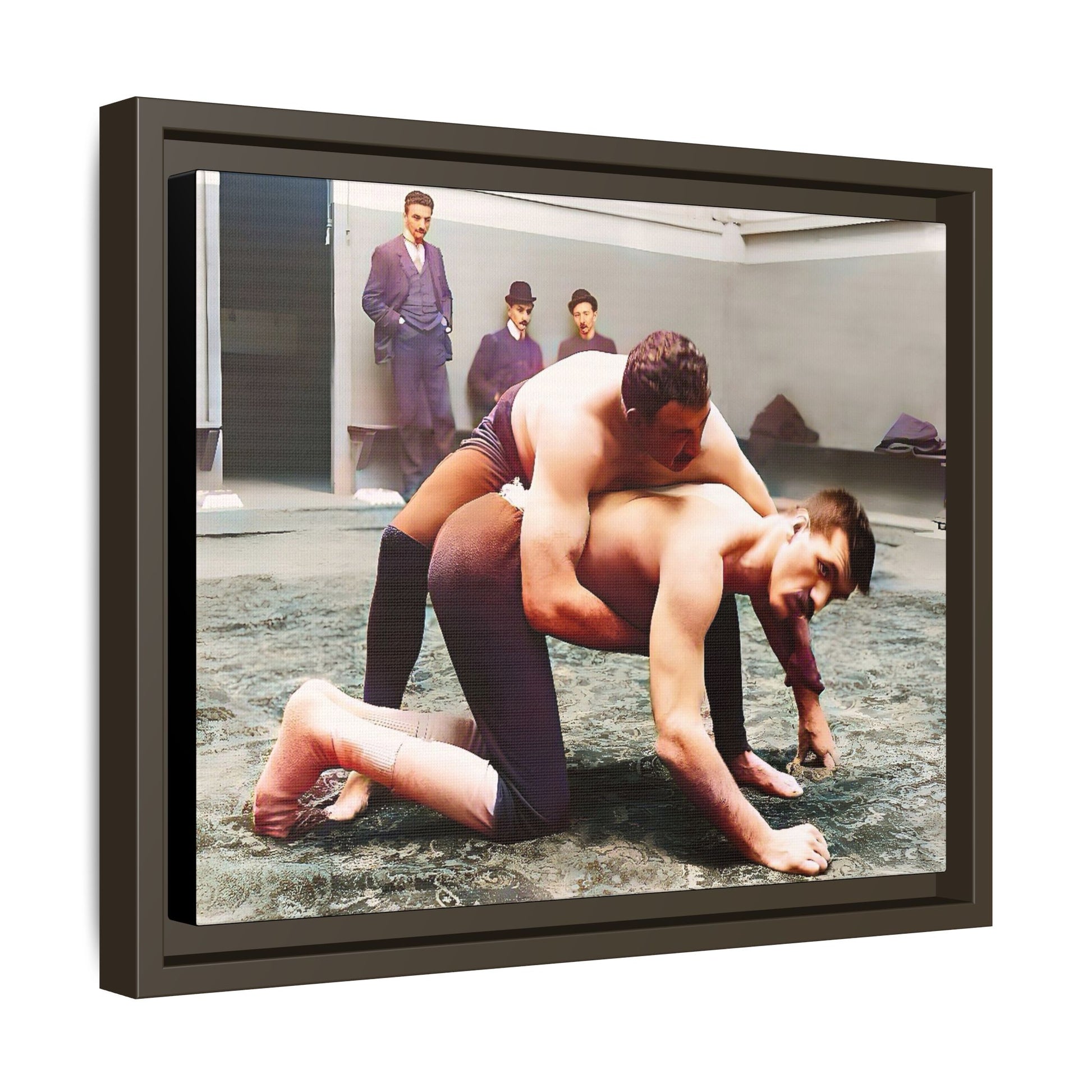 A framed vintage wrestling photograph on matte canvas featuring a Victorian-era match at Love’s Wrestling Club in Plumstead, UK, capturing strength and camaraderie.