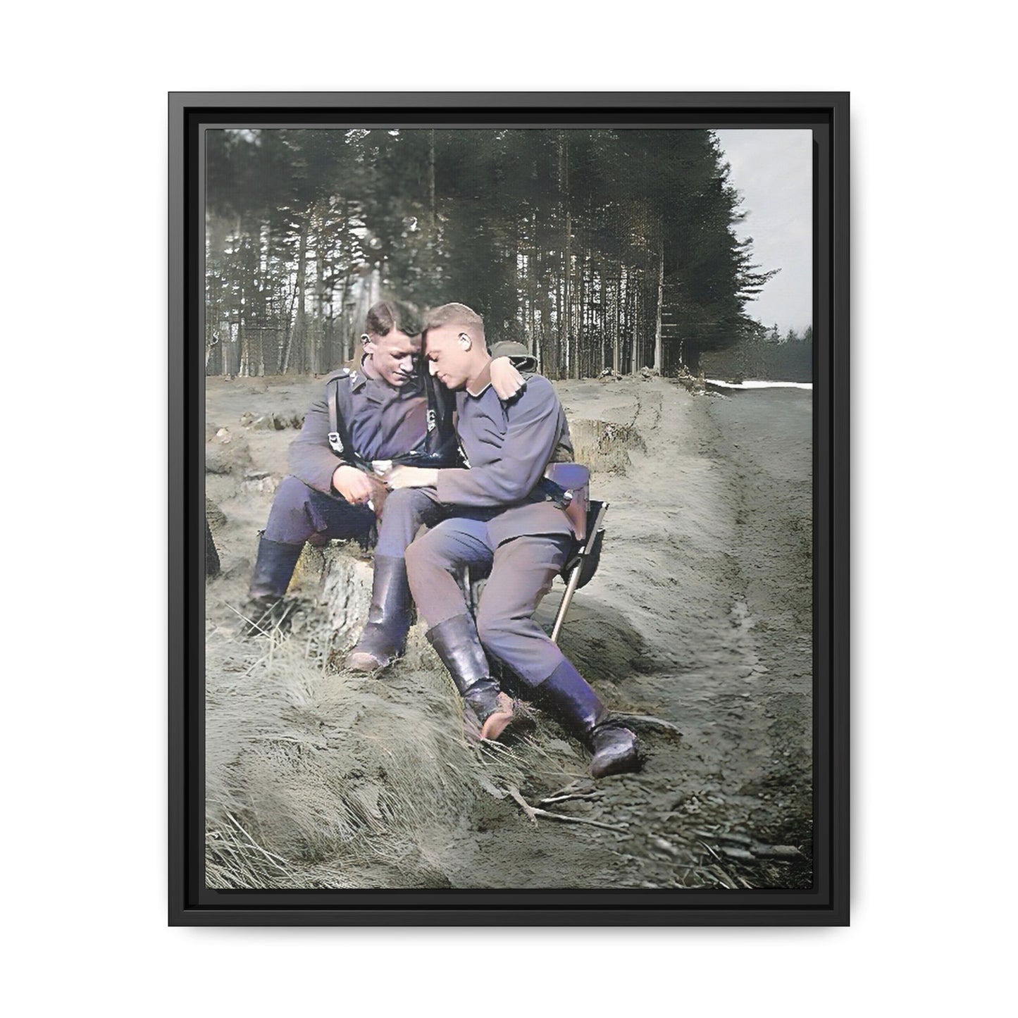 A beautifully restored WWI-era photograph featuring Felix and Engel, two soldiers seated closely on a tree stump in Verdun, France. Dressed in military uniforms with rugged boots, their affectionate expressions and serene forest backdrop capture a rare and intimate moment of connection and resilience during wartime. Vintage Foto Schwules Paar