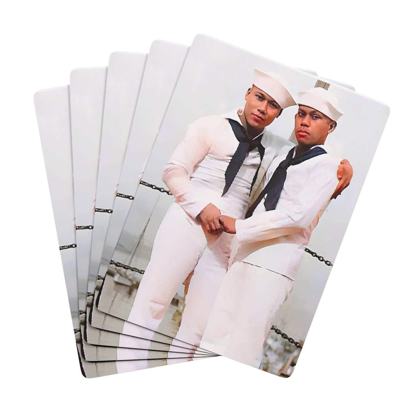 Vintage WWII photo of two sailors in white Navy uniforms embracing aboard a ship, symbolizing Queer love and resilience.