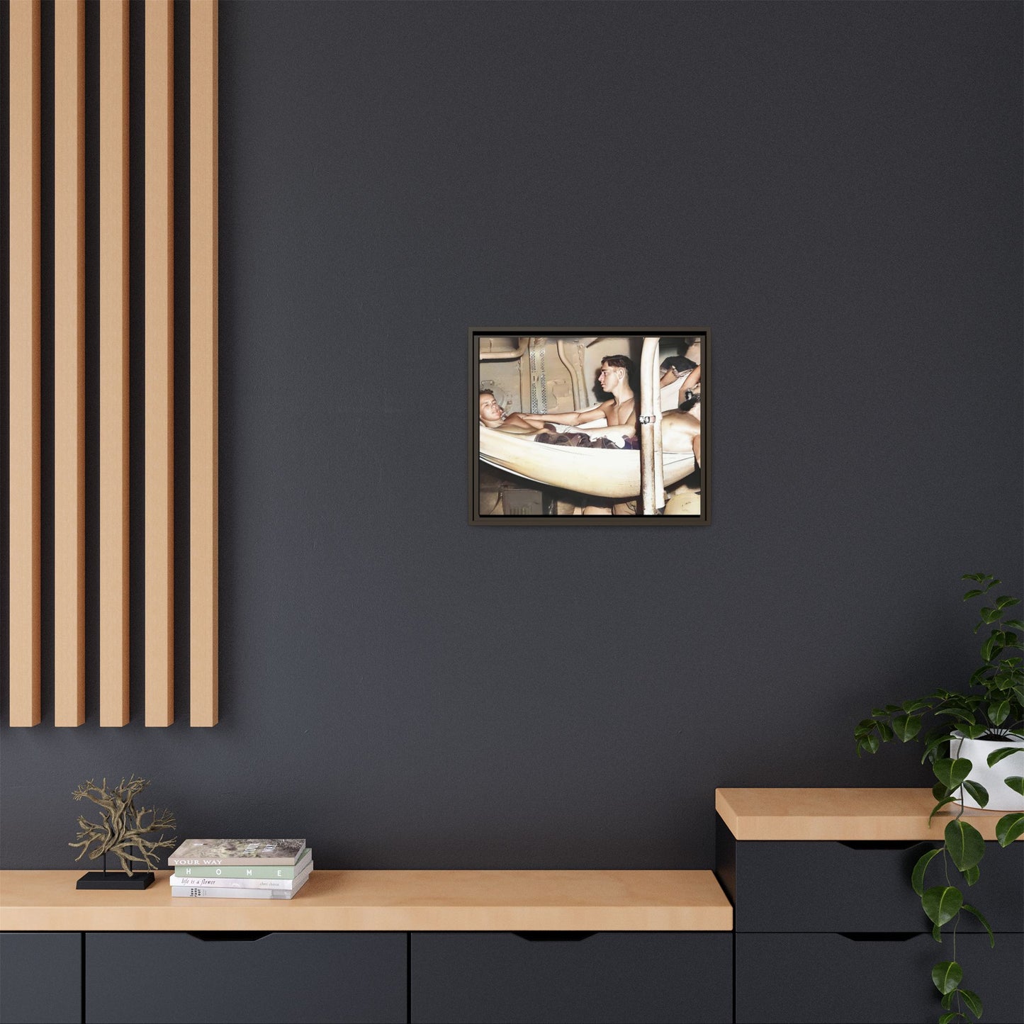 A framed vintage maritime photo on matte canvas featuring sailors aboard the Orleans, capturing life at sea and camaraderie.