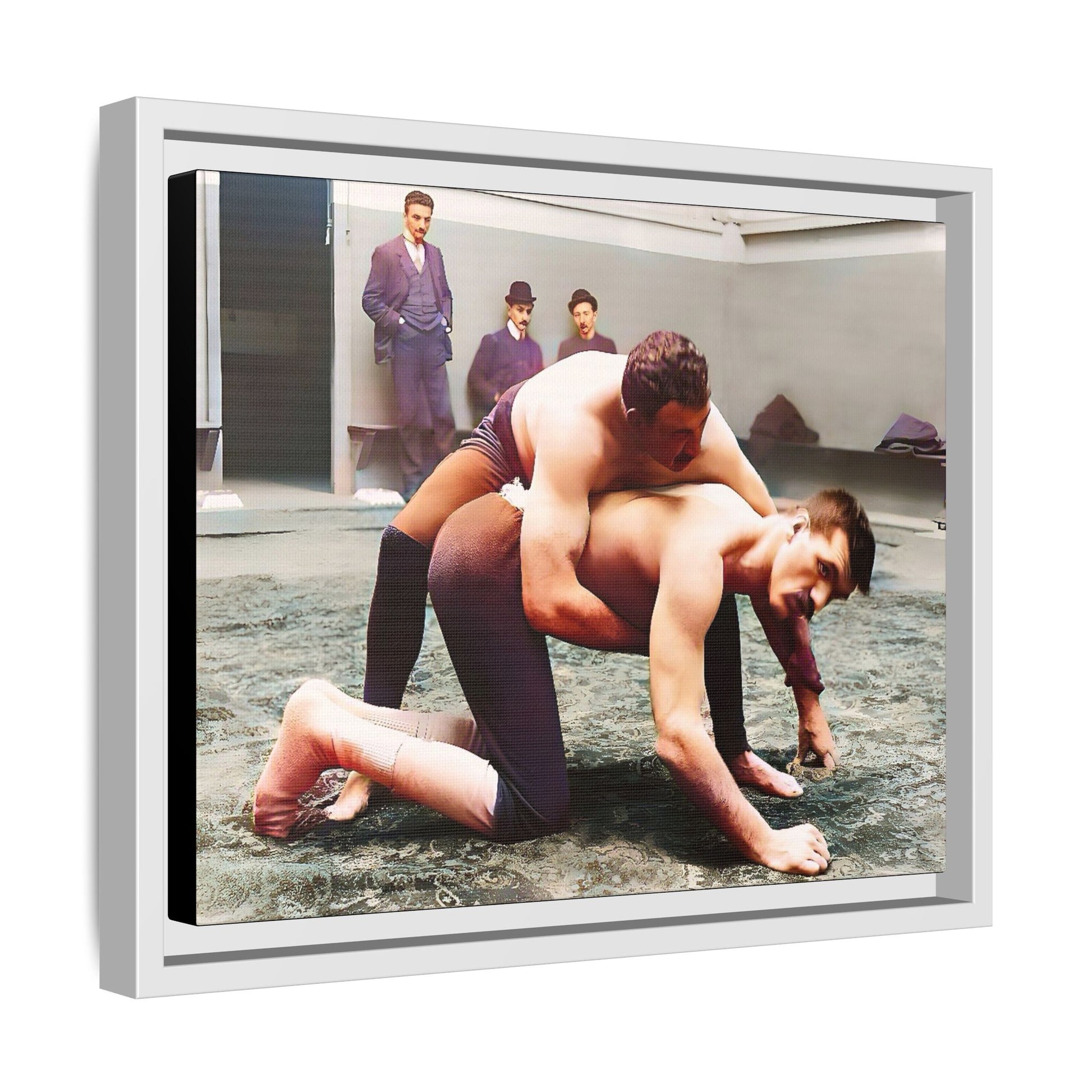 A framed vintage wrestling photograph on matte canvas featuring a Victorian-era match at Love’s Wrestling Club in Plumstead, UK, capturing strength and camaraderie.