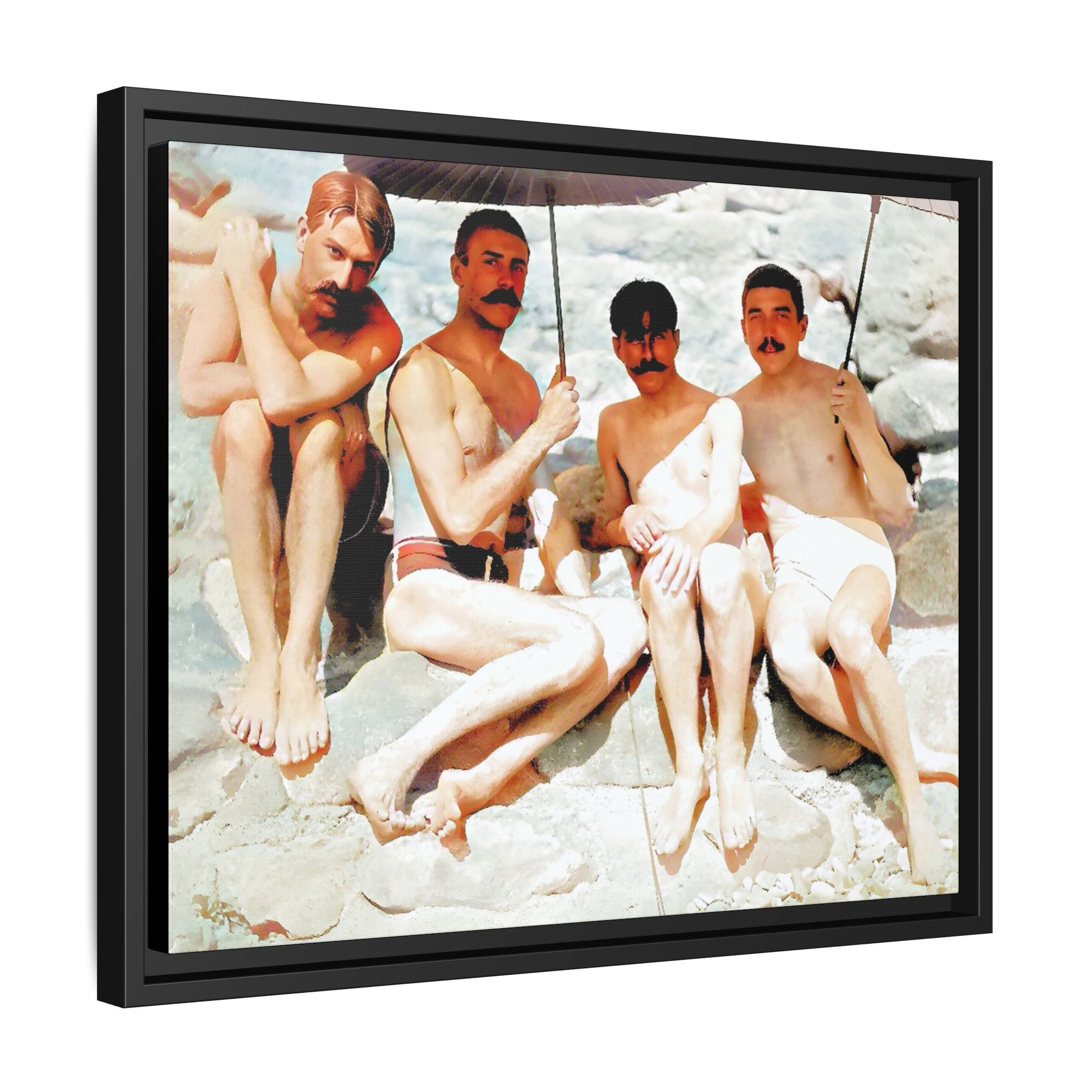 A nostalgic vintage beach photograph from Herring Cove Beach, Provincetown, MA. This framed canvas print captures four men in a relaxed summer moment, perfect for coastal home decor or as an LGBTQ+ history tribute.