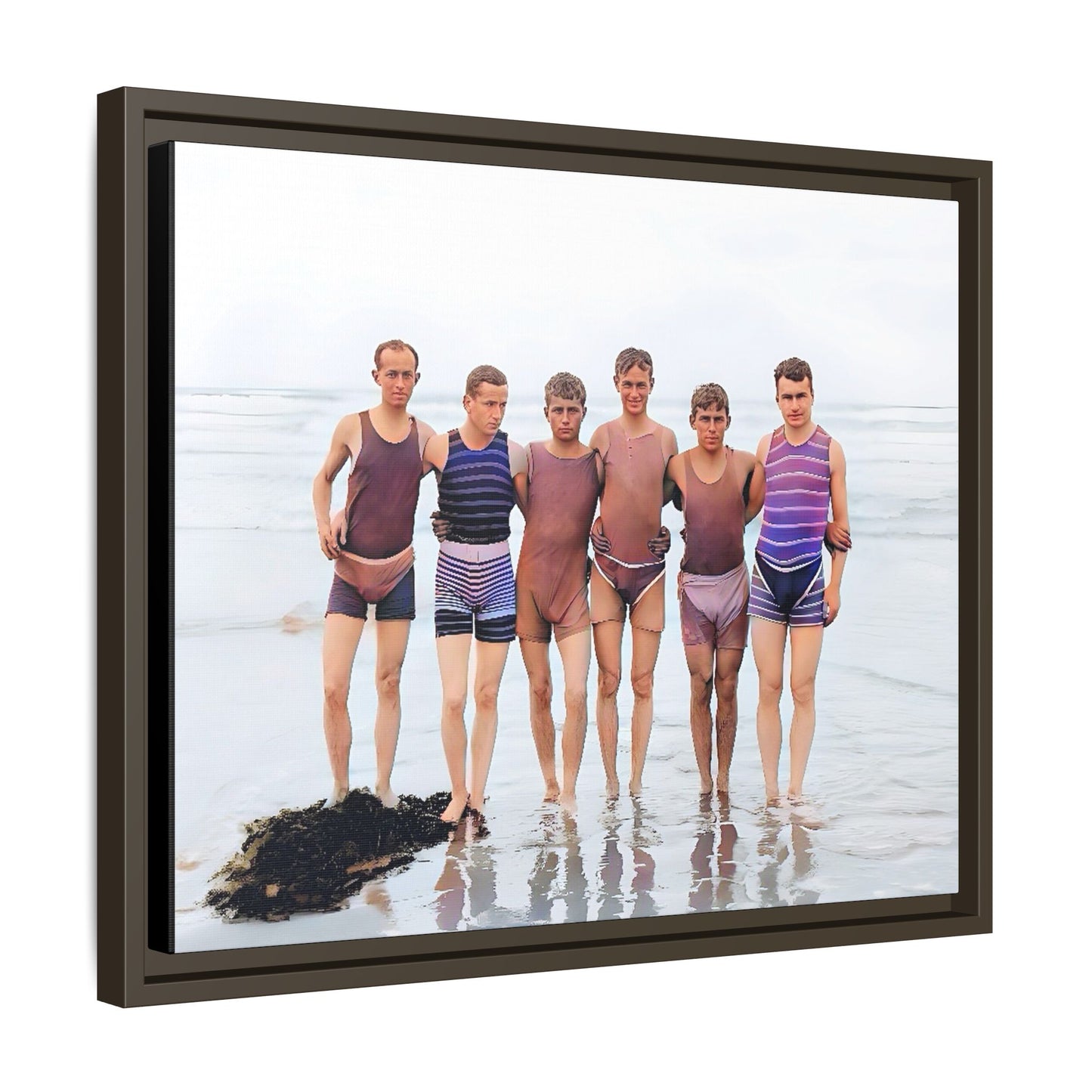 A framed vintage beach portrait on matte canvas featuring a joyful group at Herring Cove Beach, Provincetown, capturing timeless summer camaraderie.