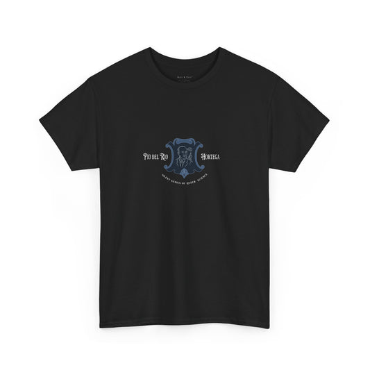 t-shirt with a Jean Cocteau–inspired line drawing of Pío del Río Hortega framed in a blue crest. This refined graphic design pays tribute to queer scientific brilliance with the phrase “Silent Genius of Queer Science” below. A bold shirt for quiet revolutions.