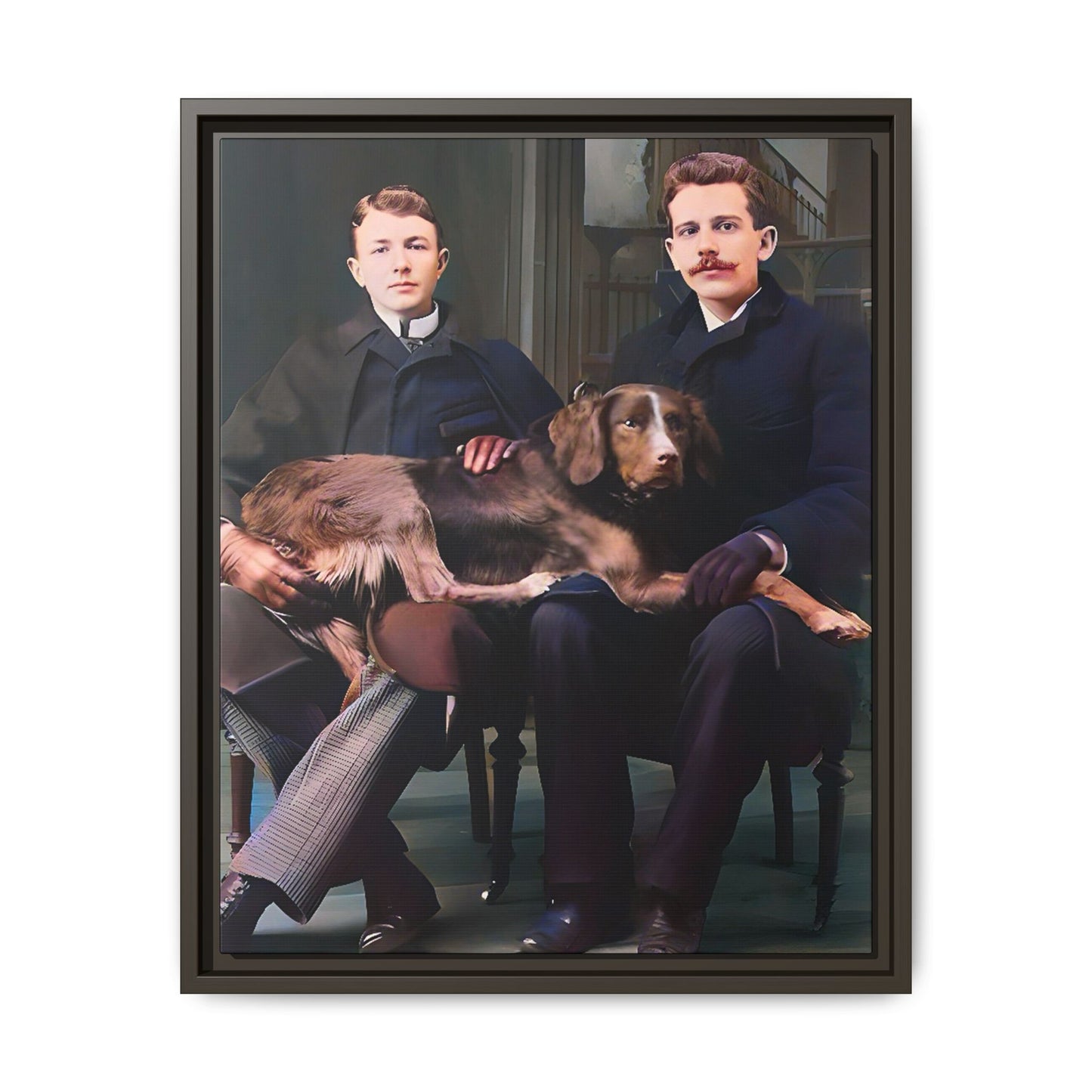 A beautifully restored 1930s black-and-white photograph featuring Clarence and Raymond seated in a stately New England home, with their beloved dog Luna resting comfortably across their laps. Dressed in refined coats and classic trousers, the couple exudes love, companionship, and timeless elegance, reflecting a warm and historic moment of LGBTQ+ history. Gay Couple