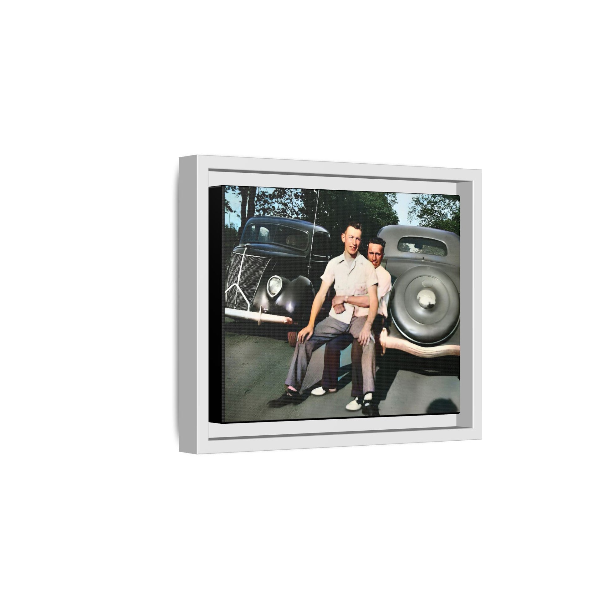 Restored vintage photograph of Andrew and Eugene seated on a classic car bumper in 1930s Lincoln, Nebraska. Framed matte canvas print celebrating LGBTQ+ history, love, and timeless companionship. Gay Couple