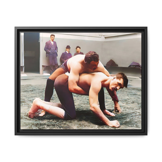 A framed vintage wrestling photograph on matte canvas featuring a Victorian-era match at Love’s Wrestling Club in Plumstead, UK, capturing strength and camaraderie.