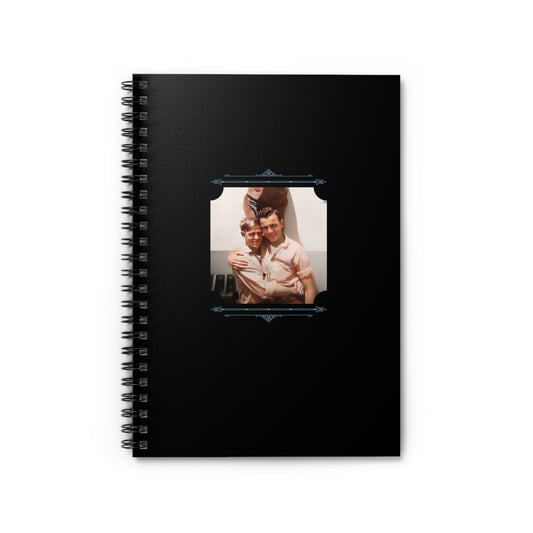 Vintage spiral notebook featuring a restored colorized photo of two smiling men embracing