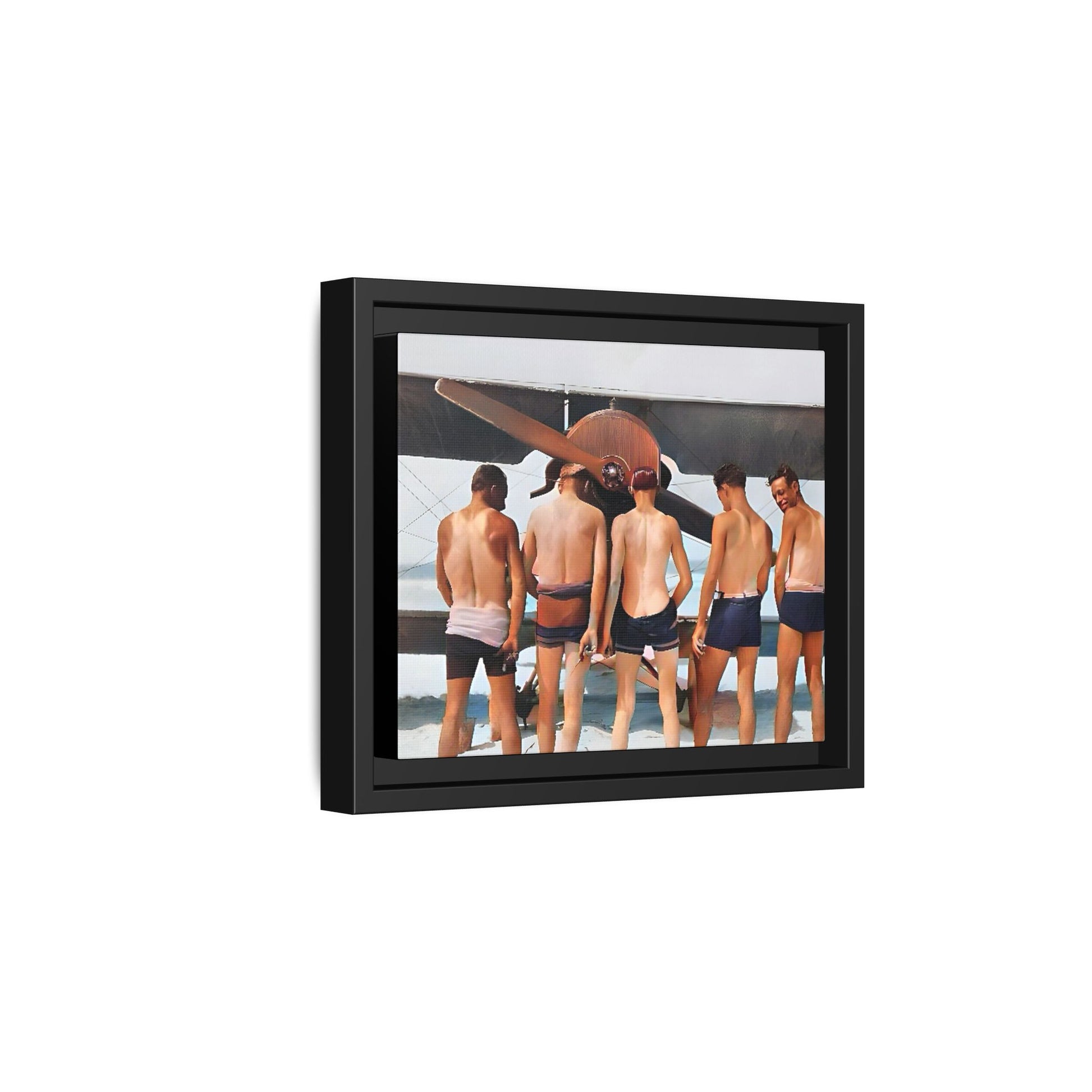 A beautifully restored vintage photograph of five men standing on a sunlit Key West beach with a vintage aircraft in the background. This nostalgic canvas print captures coastal adventure, camaraderie, and the free spirit of aviation history. Men urinating
