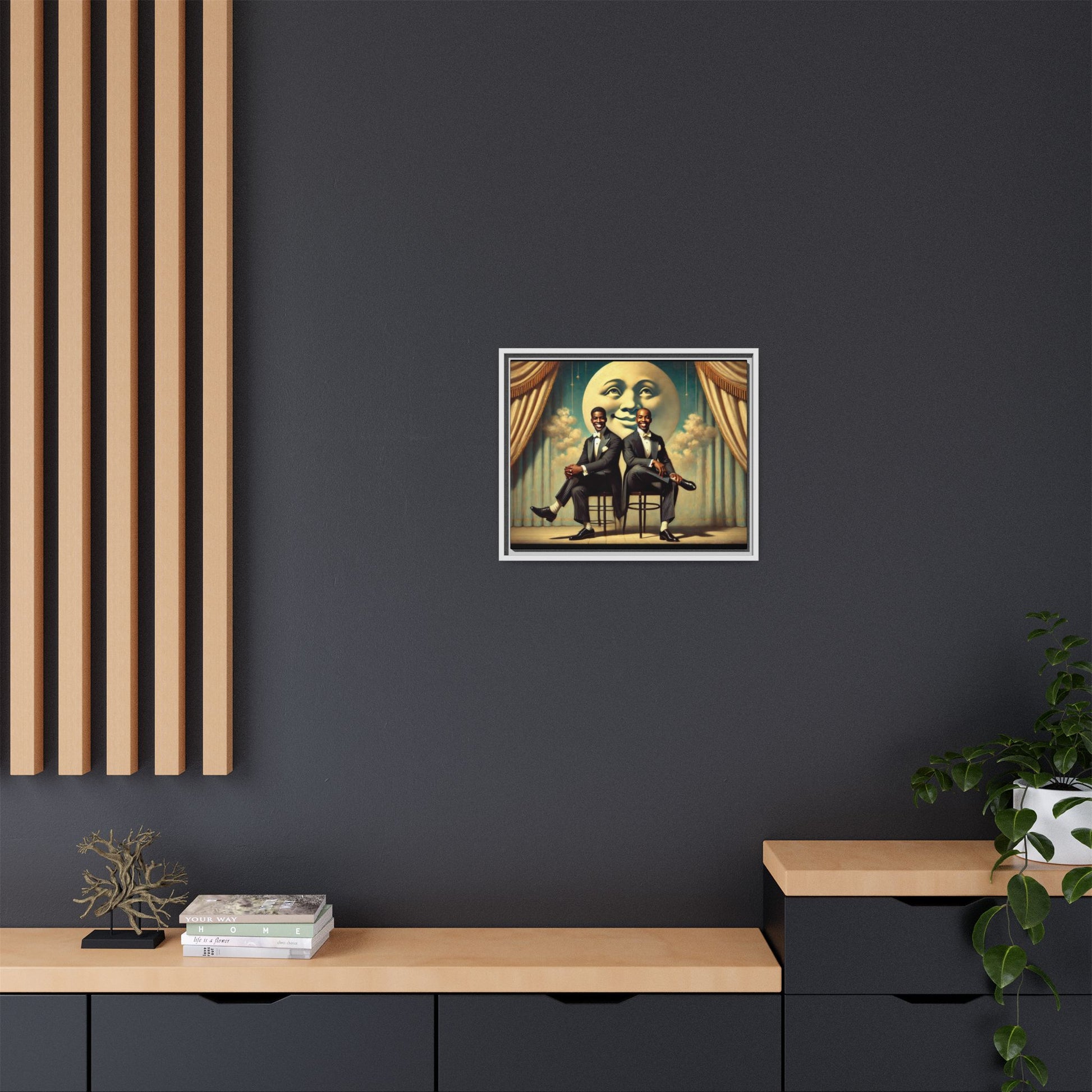 Framed vintage-style portrait of two Black men in tuxedos seated under a smiling crescent moon prop with golden curtains and cloud backdrop. This restored matte canvas honors lost LGBTQ history and reclaims early 20th-century queer representation with pride.