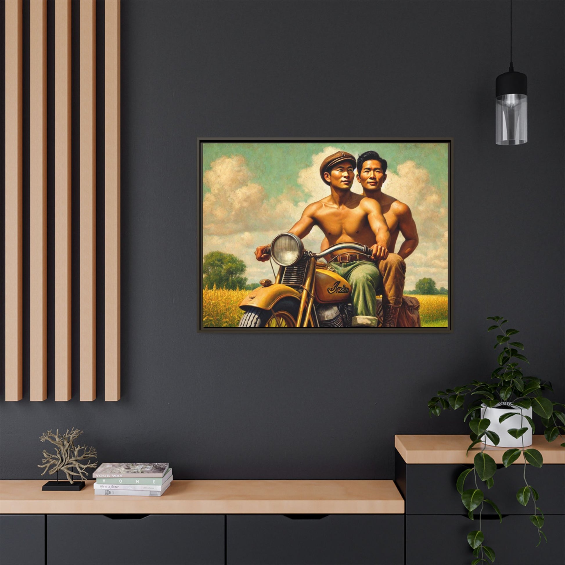 Framed artwork of an Asian-American gay couple riding a vintage yellow motorcycle through Iowa's serene countryside, celebrating love and unity.