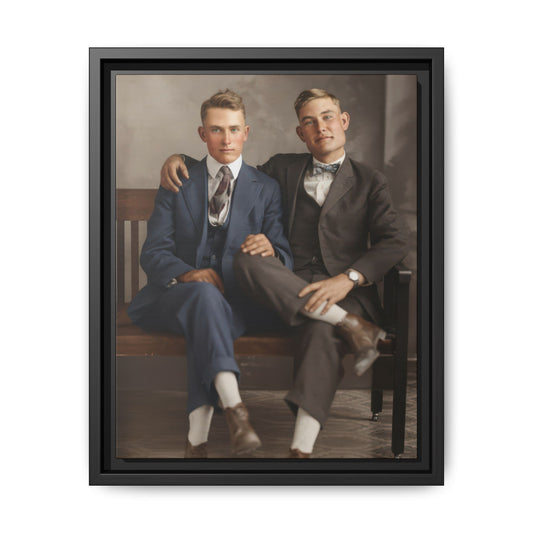 Vintage portrait of two companions seated on a bench in tailored suits