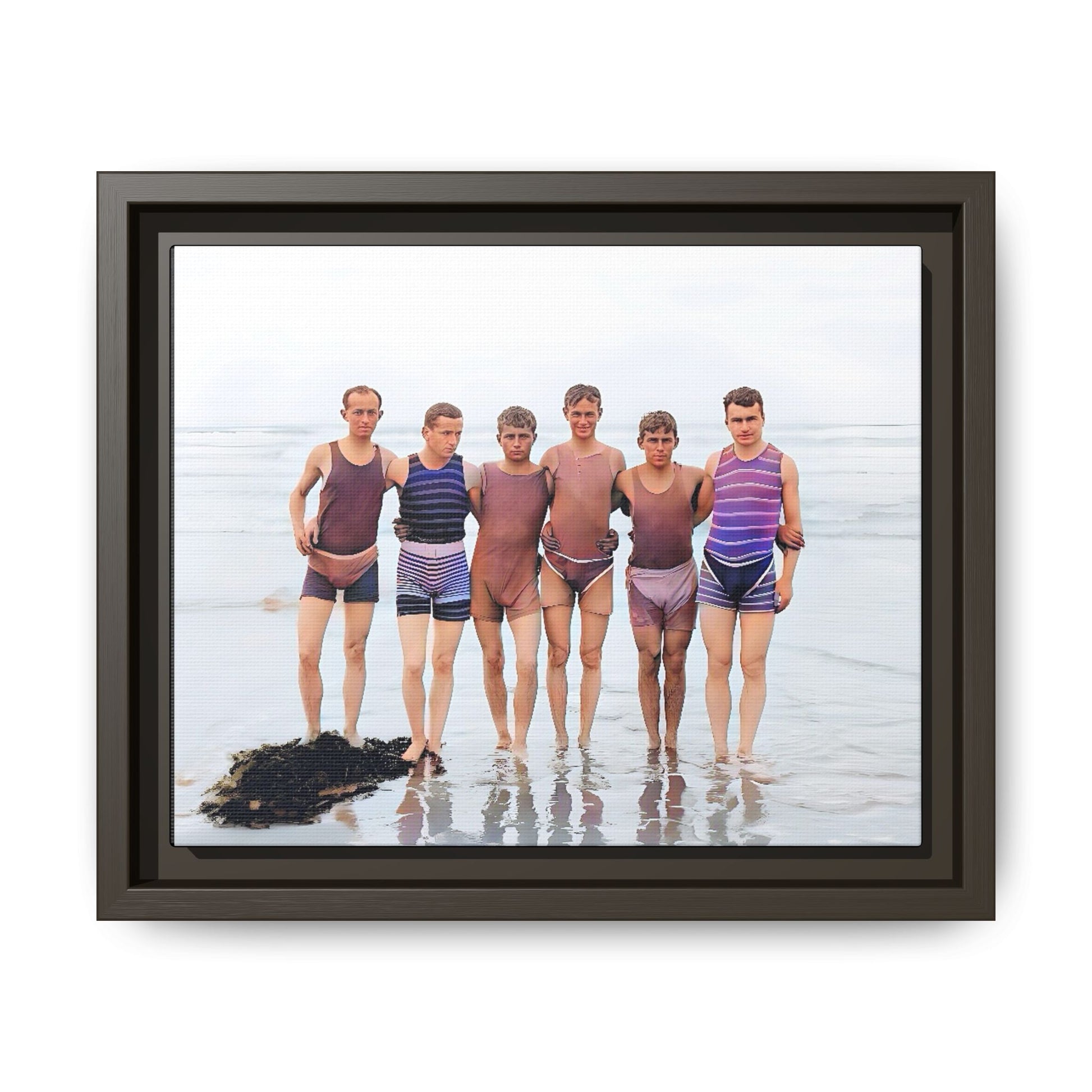 A framed vintage beach portrait on matte canvas featuring a joyful group at Herring Cove Beach, Provincetown, capturing timeless summer camaraderie.