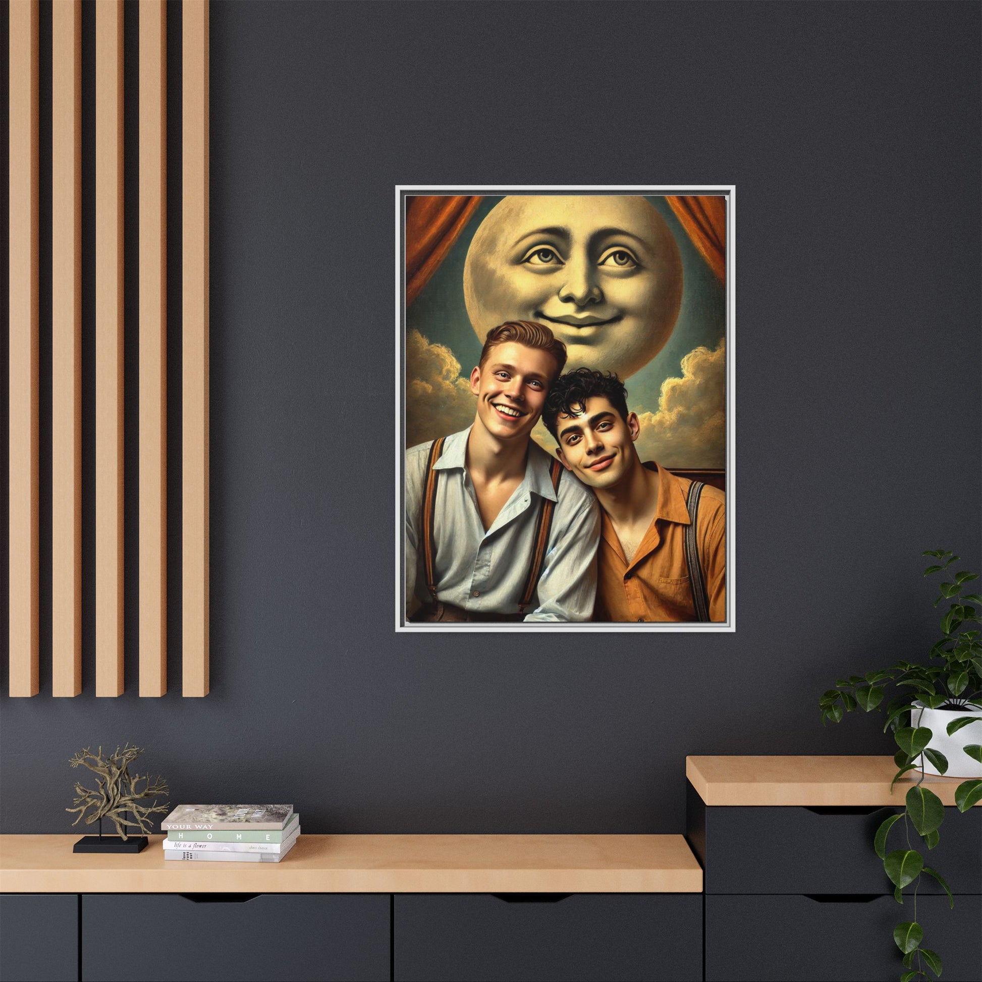 Framed artwork featuring a joyful queer couple in 1930s attire, seated close together beneath a smiling full moon in a theatrical studio setting. A celebration of reclaimed LGBTQ+ narratives in nostalgic portraiture.