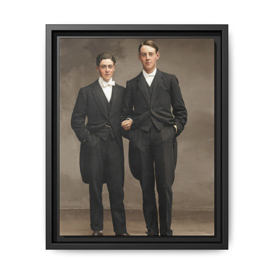 Vintage formal portrait of two standing companions in dark evening suits
