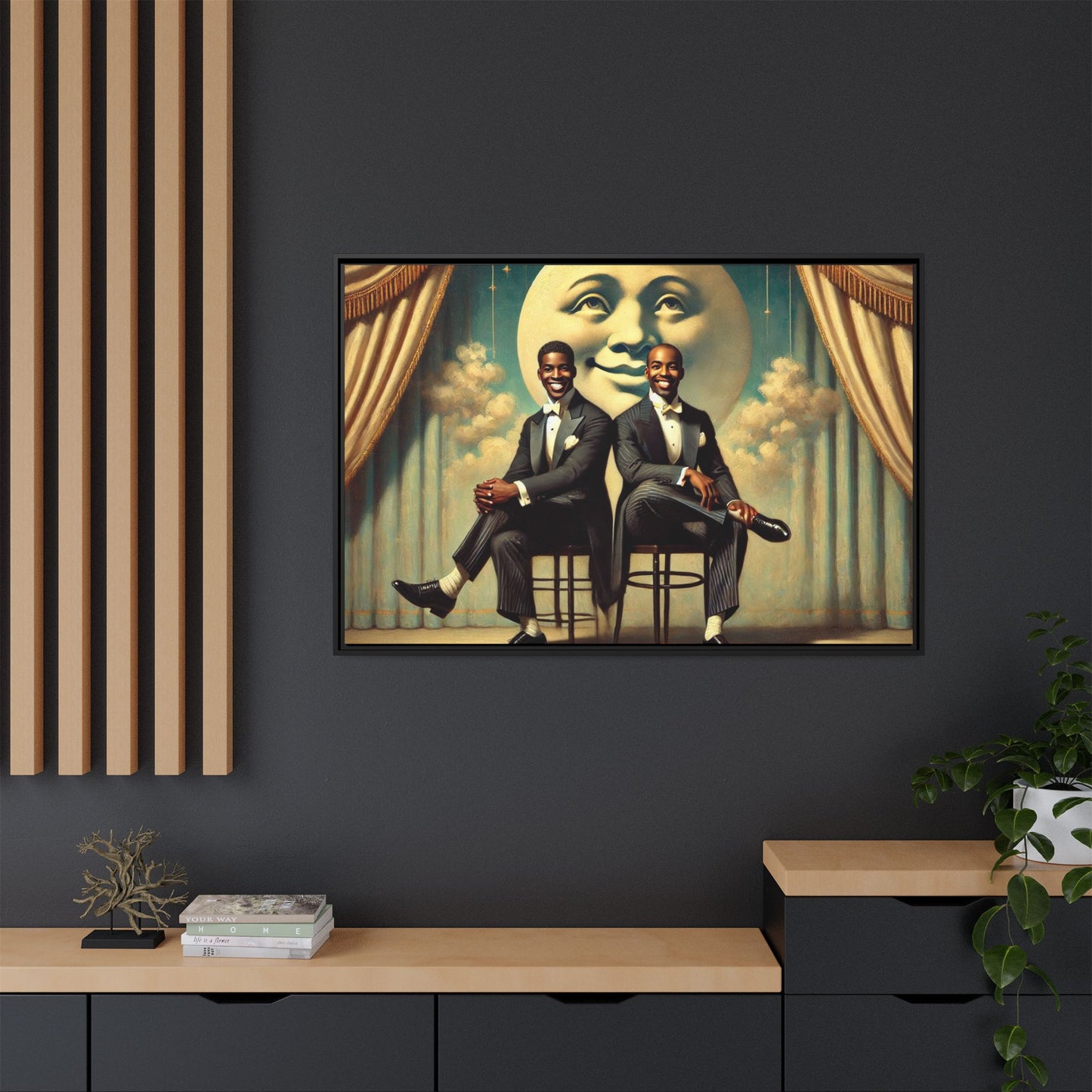 Framed vintage-style portrait of two Black men in tuxedos seated under a smiling crescent moon prop with golden curtains and cloud backdrop. This restored matte canvas honors lost LGBTQ history and reclaims early 20th-century queer representation with pride.