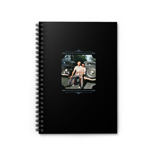 Spiral notebook with a restored photo of two men affectionately posed in front of vintage 1940s cars