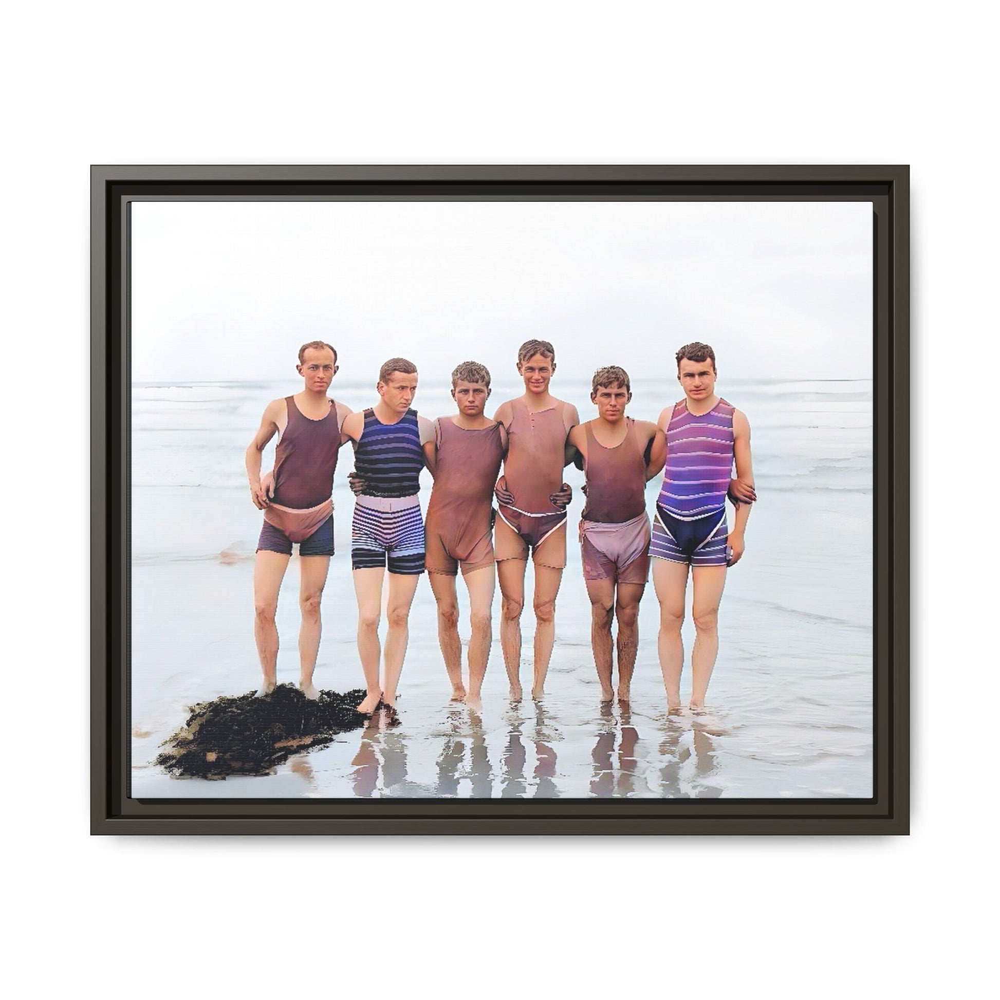 A framed vintage beach portrait on matte canvas featuring a joyful group at Herring Cove Beach, Provincetown, capturing timeless summer camaraderie.