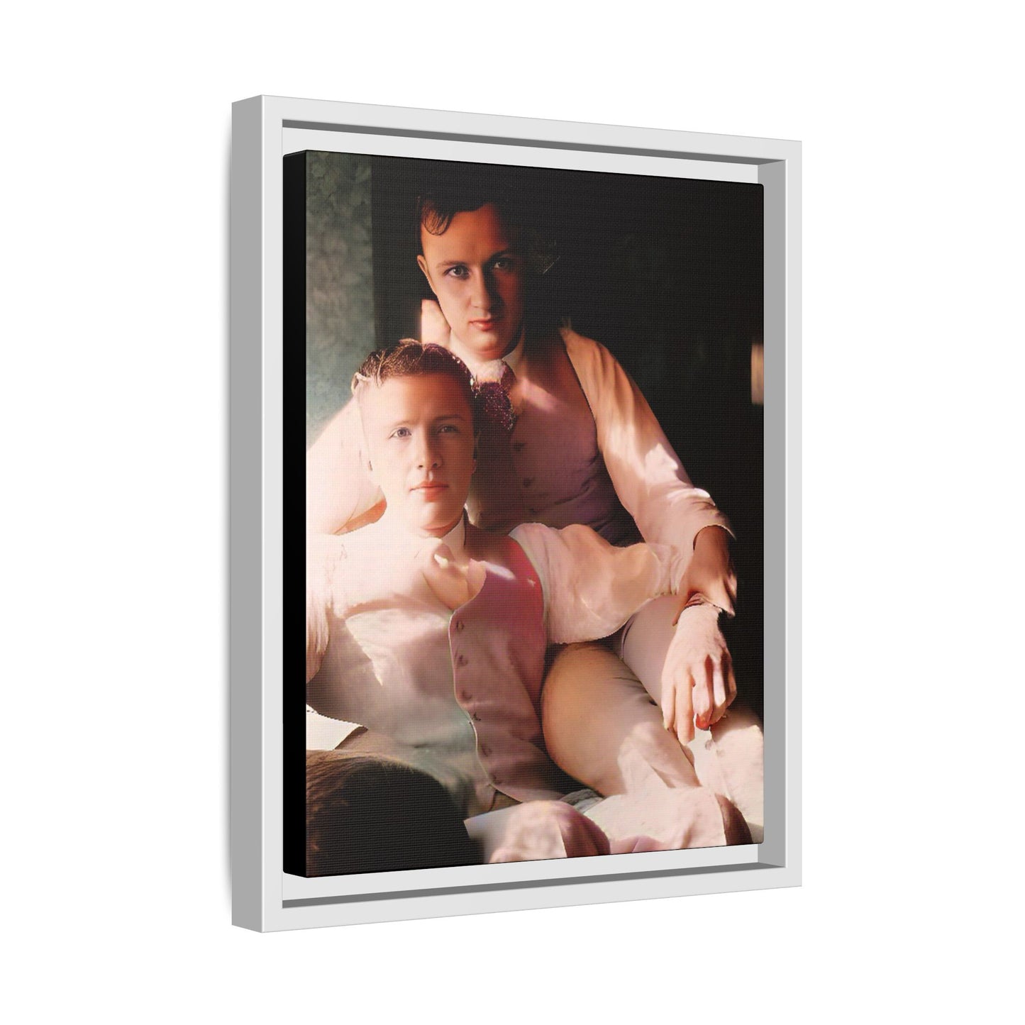 Restored vintage photograph of James and Henry, an early 1900s LGBTQ+ couple from Dayton, Ohio, sharing an intimate, sunlit moment. Framed matte canvas print celebrating love, devotion, and LGBTQ+ history.