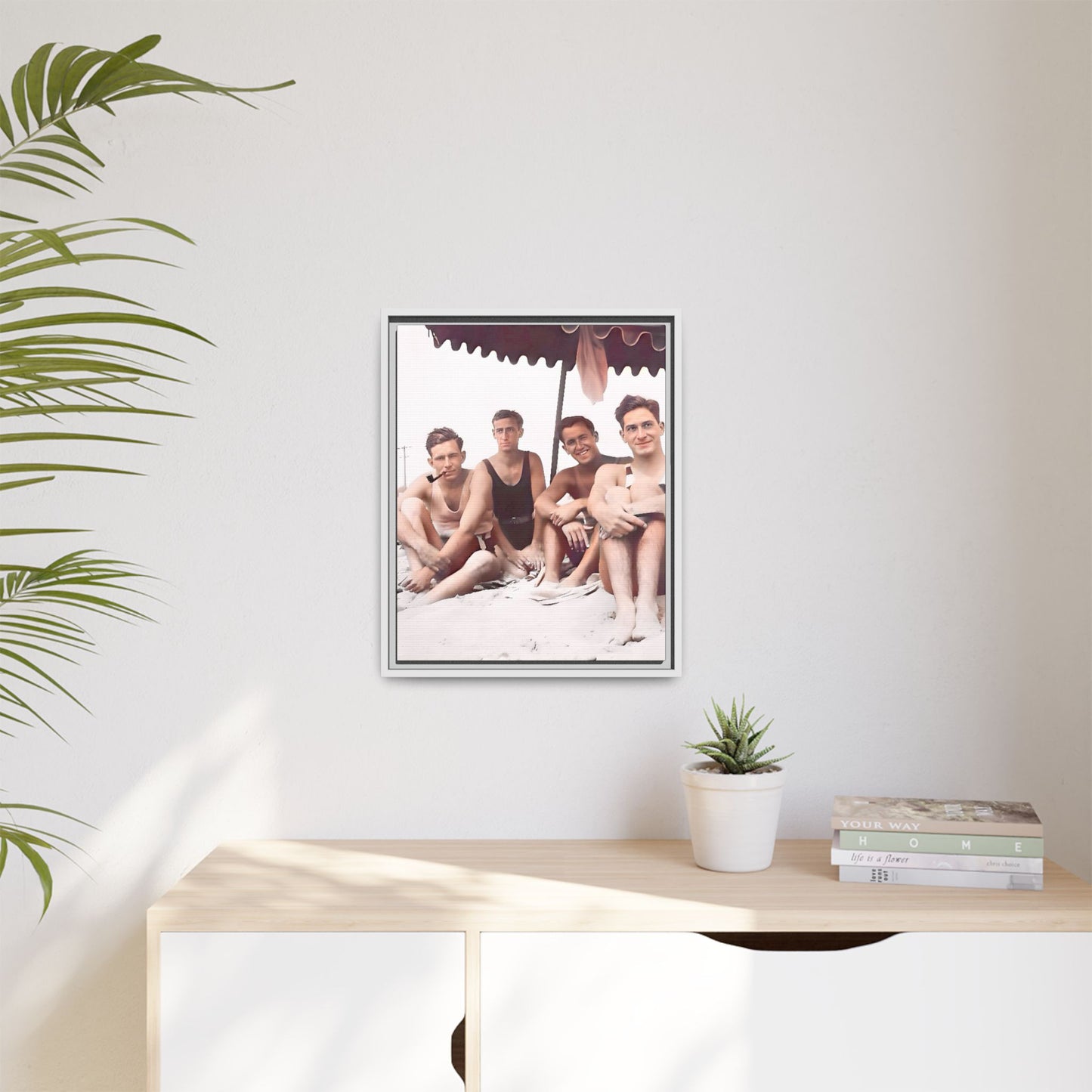 Restored vintage 1920s photograph of men enjoying a sunny beach day in Asbury Park, New Jersey, under a striped canopy. Framed matte canvas print celebrating LGBTQ+ history, joy, and camaraderie