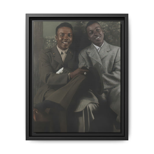 Vintage studio portrait of two African-American men seated together, one in military uniform and one in a light overcoat
