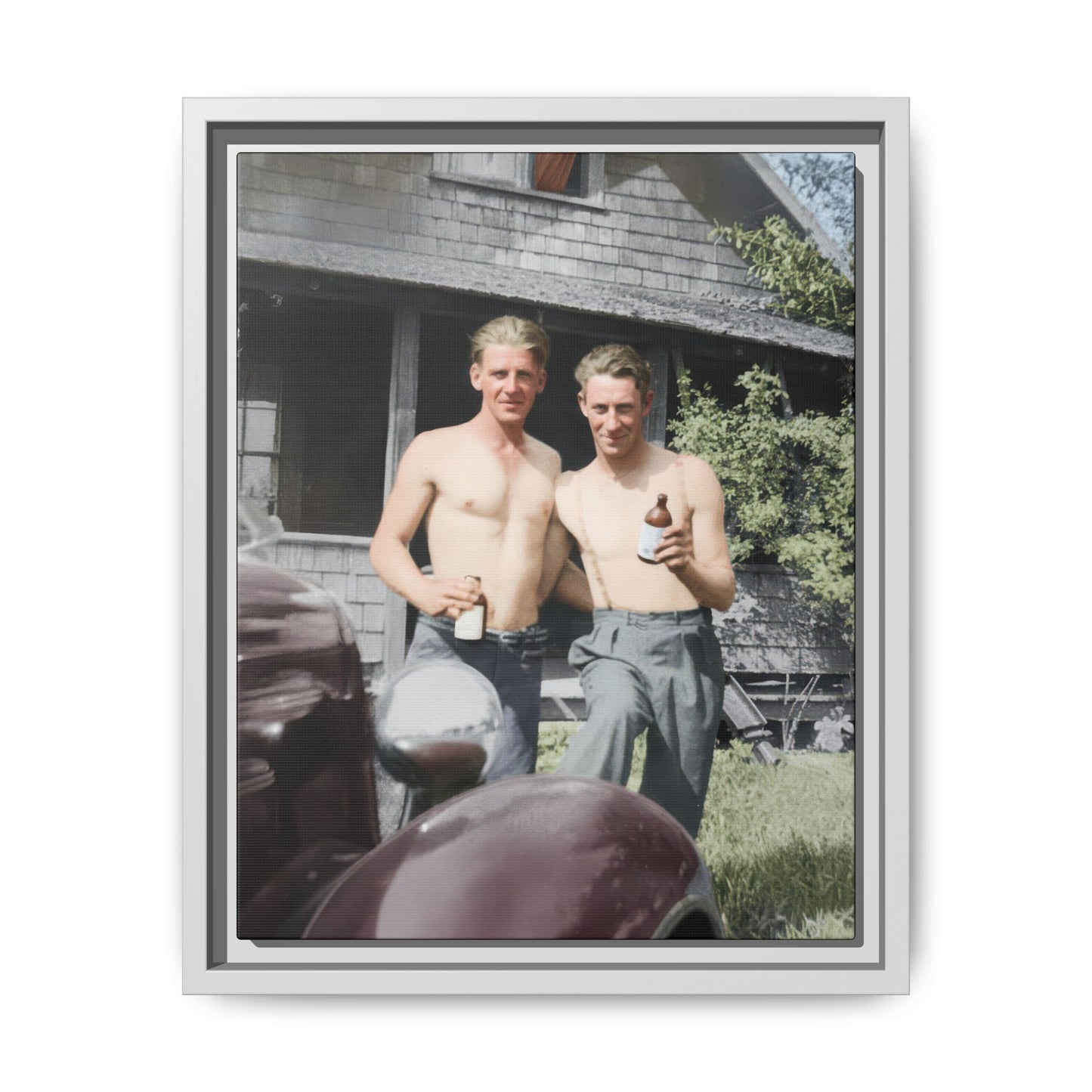 Vintage cabin portrait with automobile foreground and relaxed two-figure composition canvas print