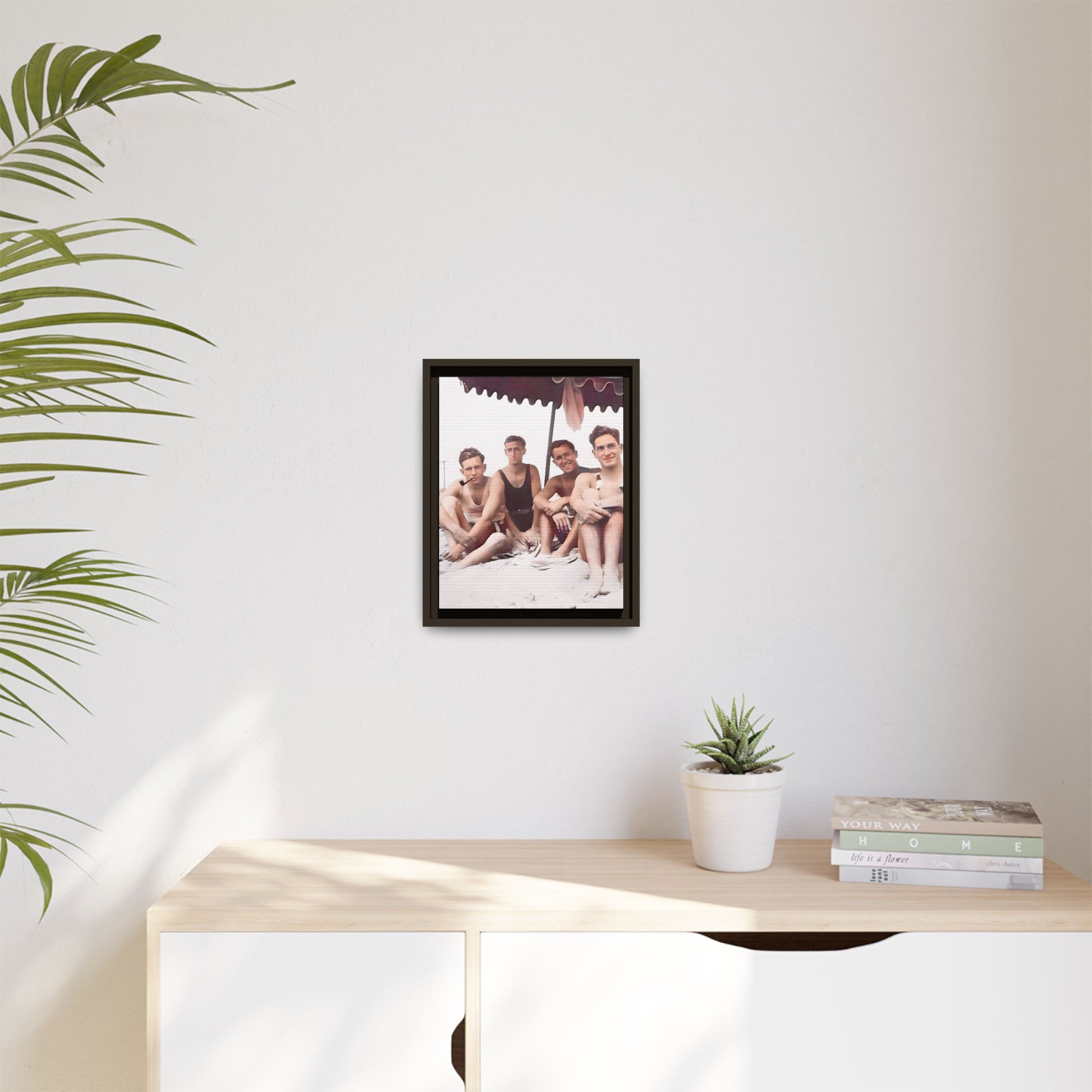 Restored vintage 1920s photograph of men enjoying a sunny beach day in Asbury Park, New Jersey, under a striped canopy. Framed matte canvas print celebrating LGBTQ+ history, joy, and camaraderie