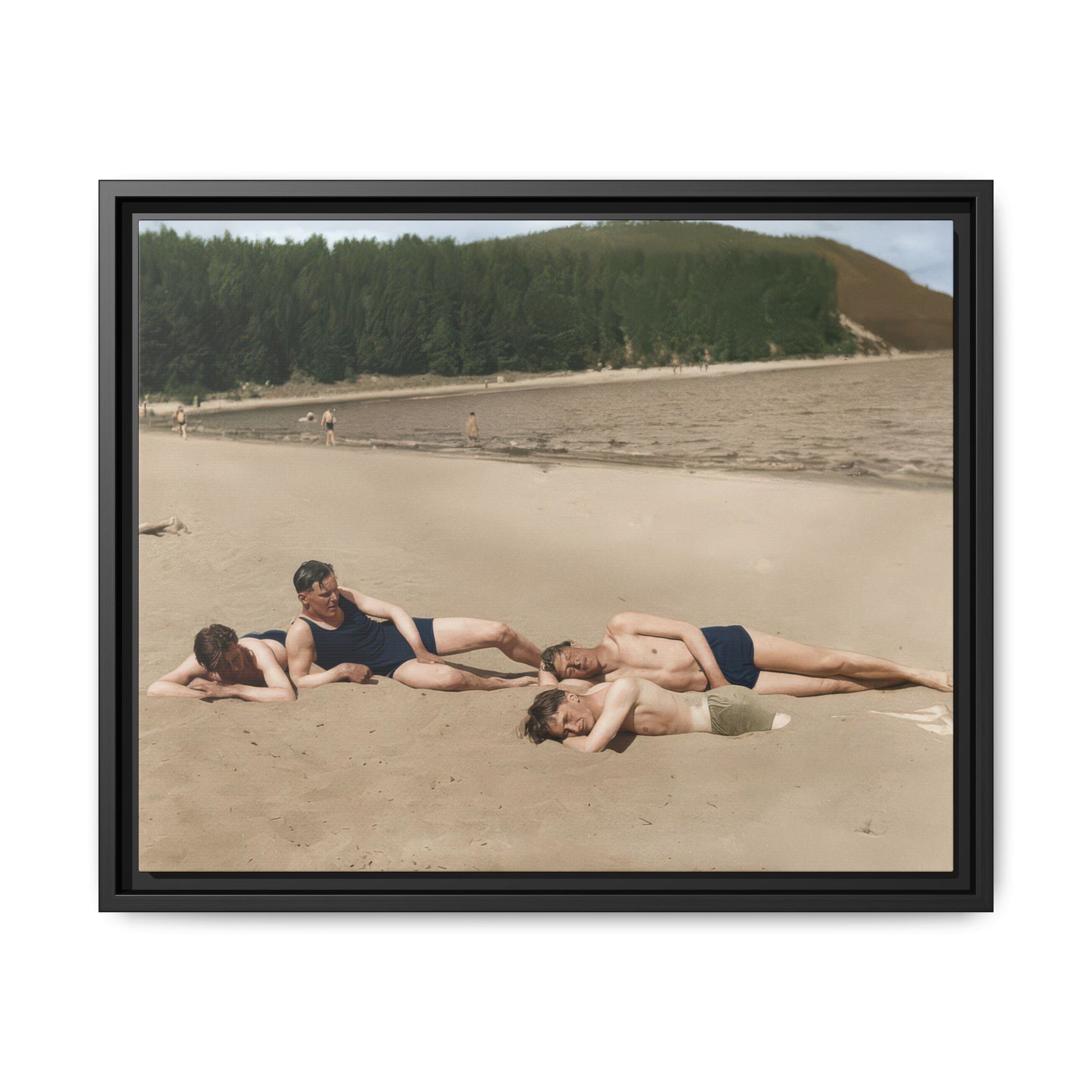Historical beach photograph reproduced as framed matte canvas with wooded shoreline in background 