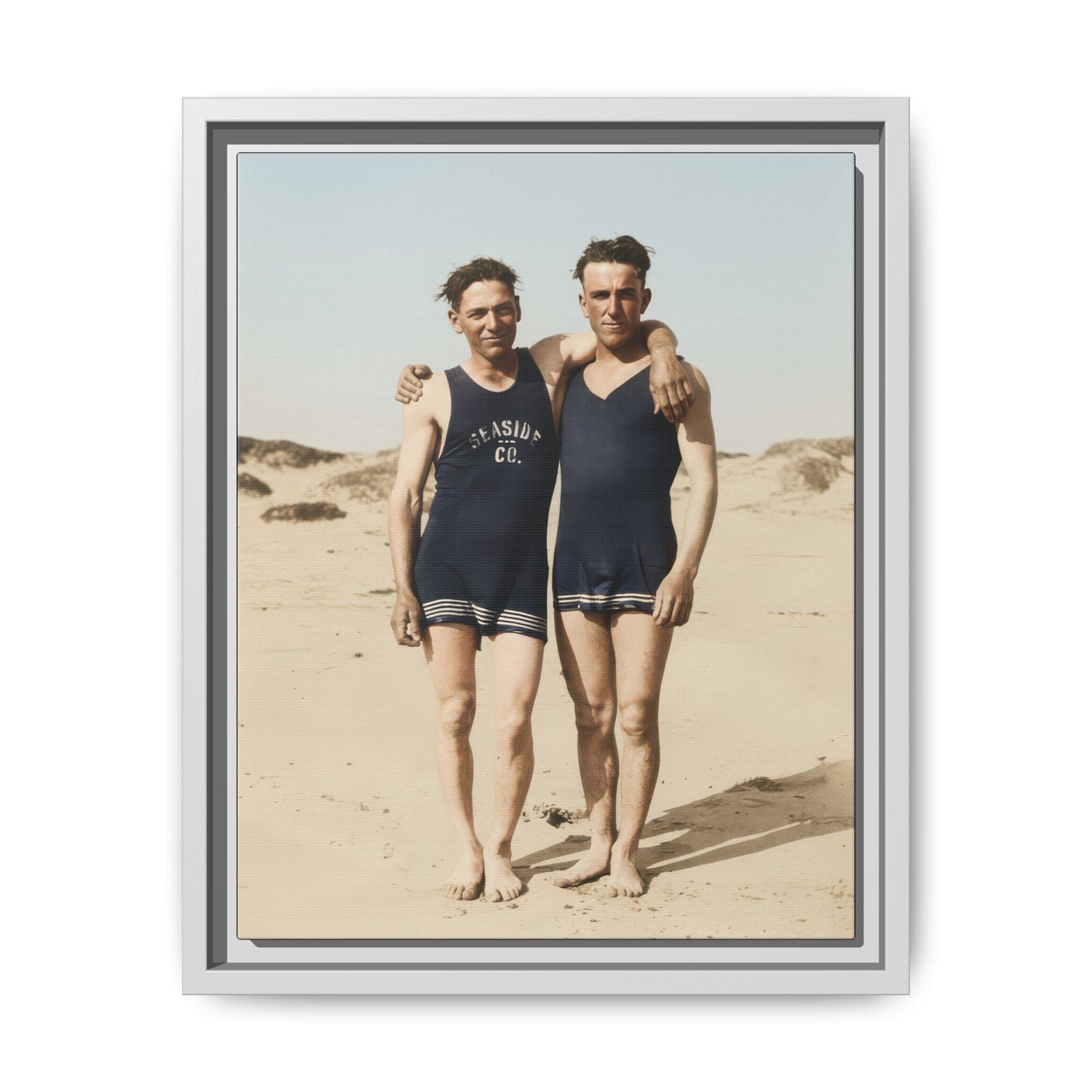 Vintage beach portrait with two barefoot figures against sand dunes and sky 