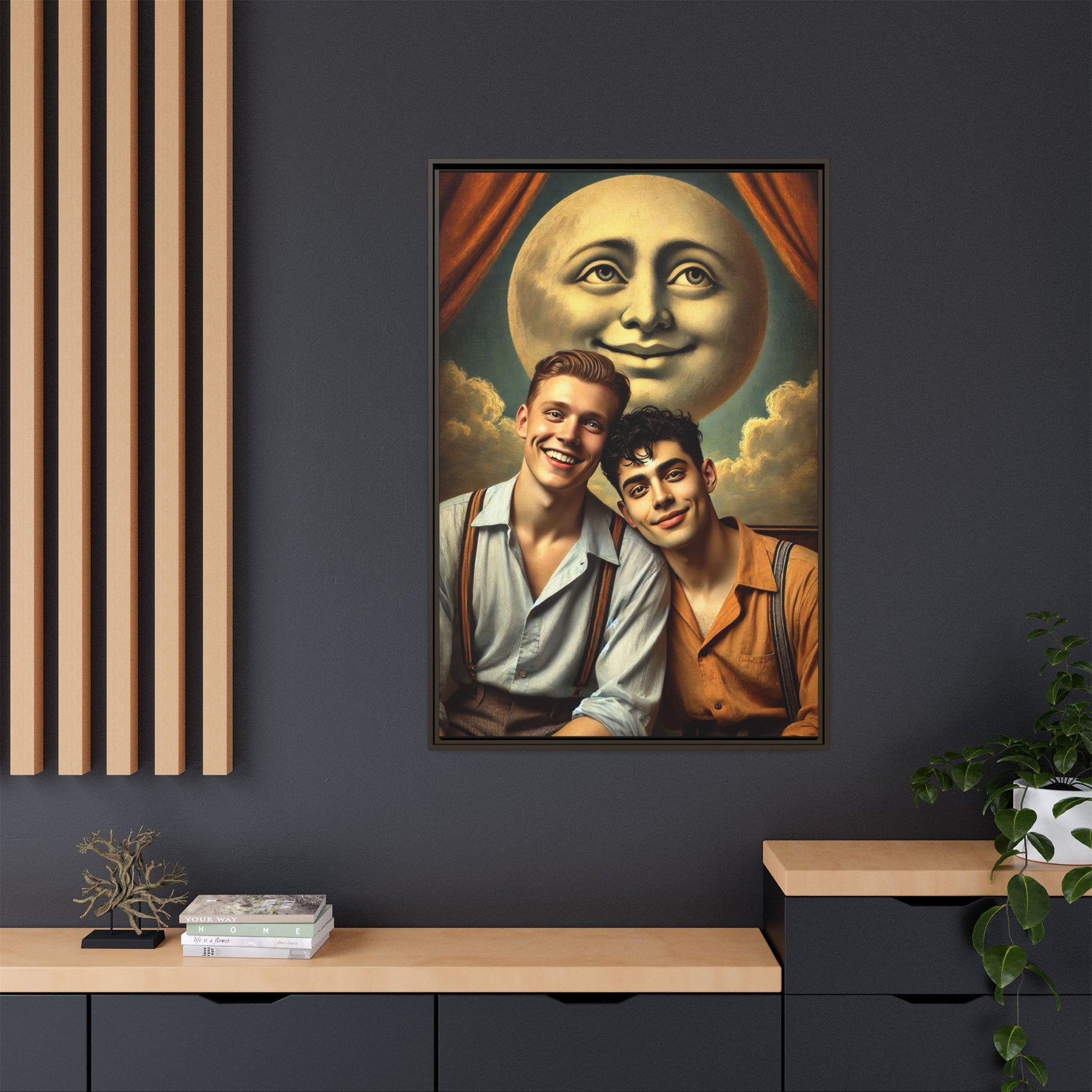 Framed artwork featuring a joyful queer couple in 1930s attire, seated close together beneath a smiling full moon in a theatrical studio setting. A celebration of reclaimed LGBTQ+ narratives in nostalgic portraiture.