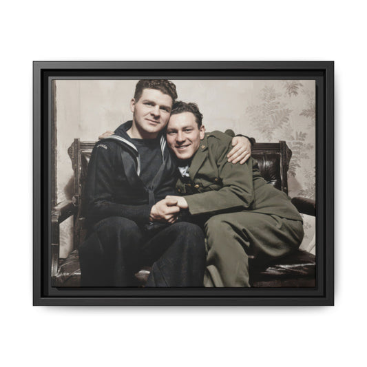 Vintage seated double portrait of two men in sailor and military-style uniforms embracing on a wooden bench