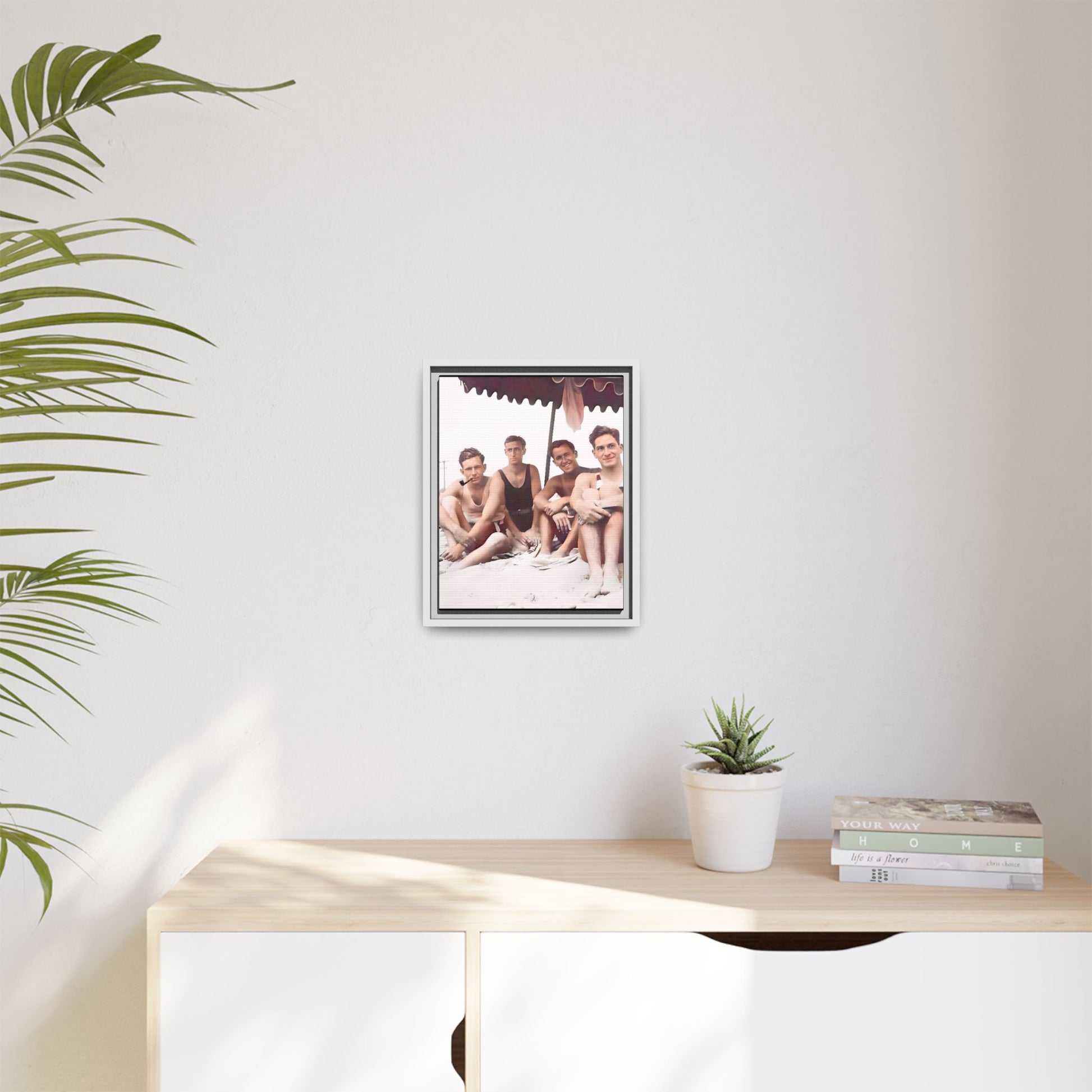 Restored vintage 1920s photograph of men enjoying a sunny beach day in Asbury Park, New Jersey, under a striped canopy. Framed matte canvas print celebrating LGBTQ+ history, joy, and camaraderie