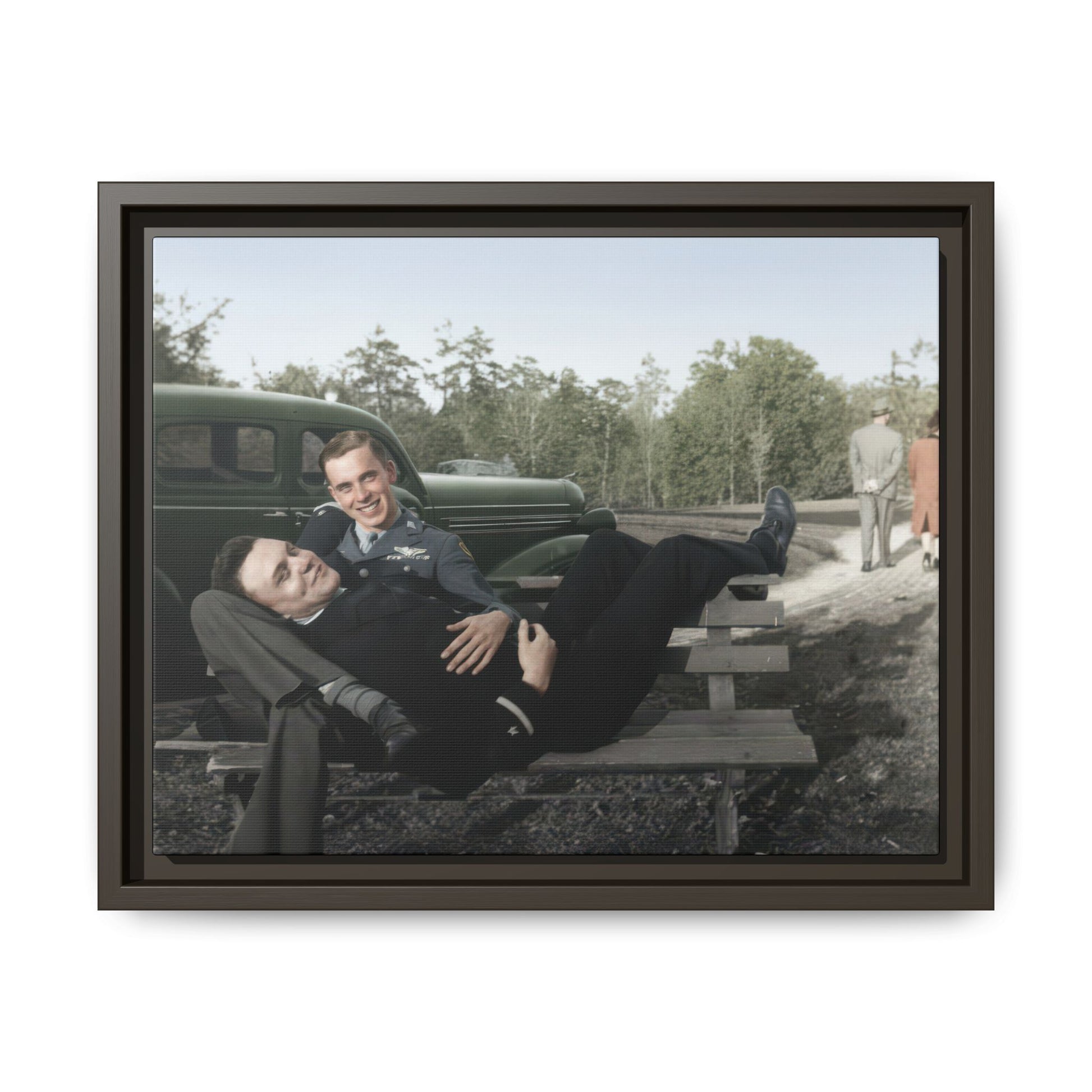 Vintage roadside portrait with car, bench, and distant walking figures canvas print